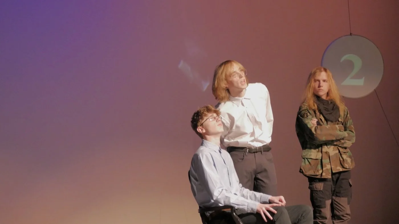 Blake Kump, Mason Lester, and Joan Patrello speaking in Jax Schuck's Entropy.