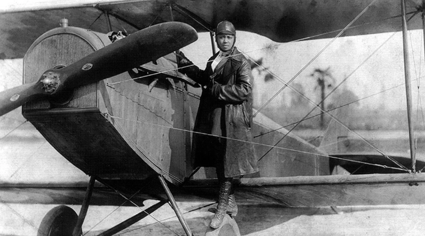 Bessie Coleman with Plane.jpg