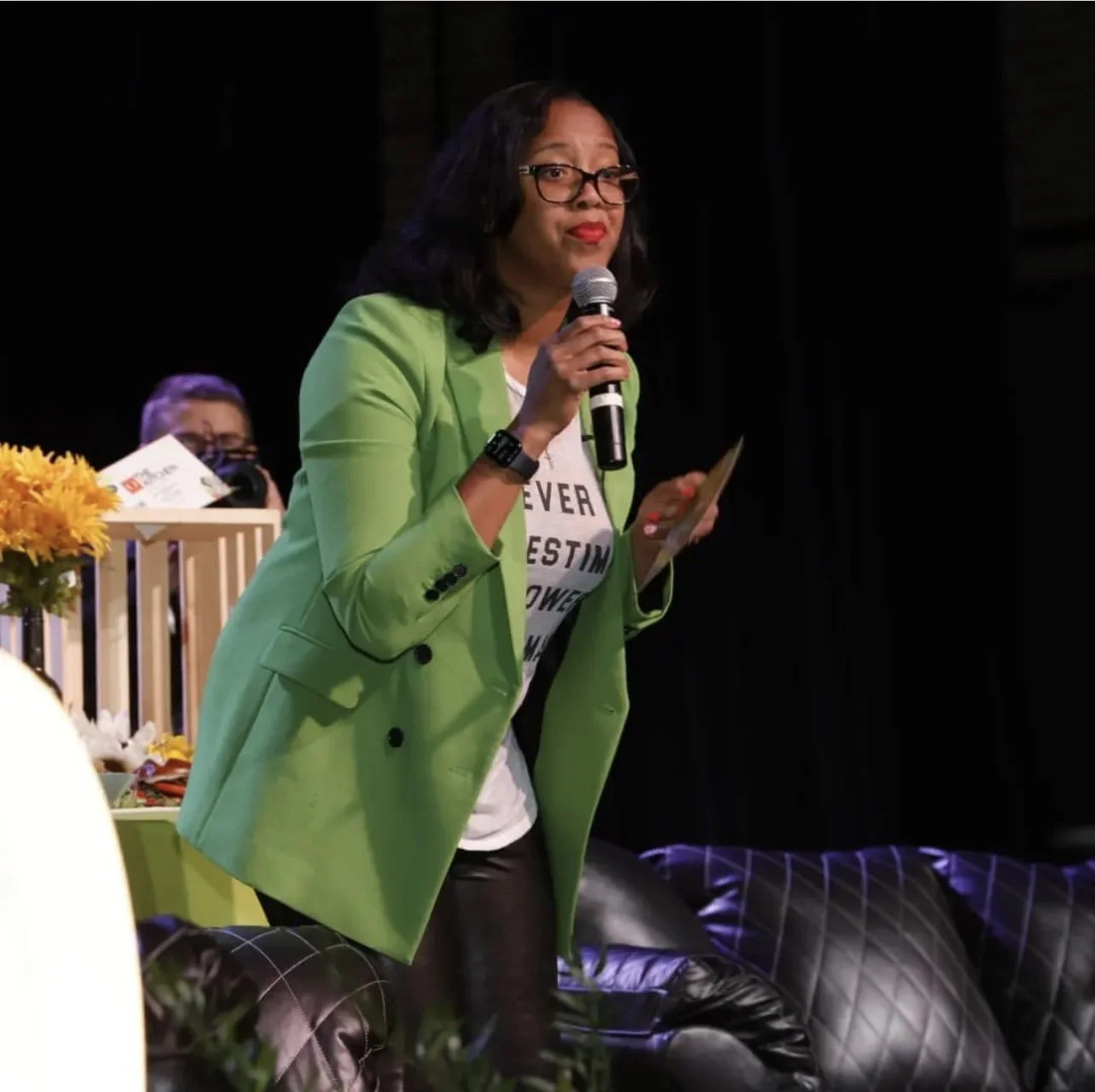 Quiana Que Rice speaking on stage