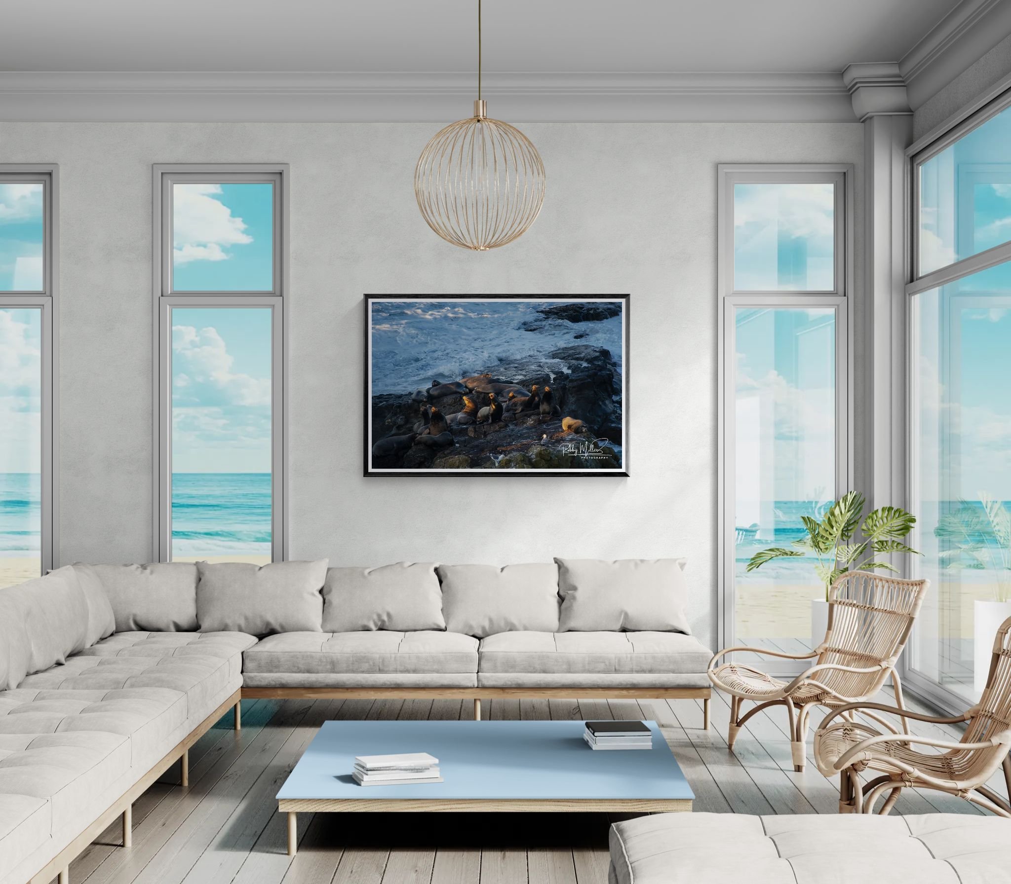 Singing_Sea_Lions_Living room with a large sofa and ocean views.jpeg
