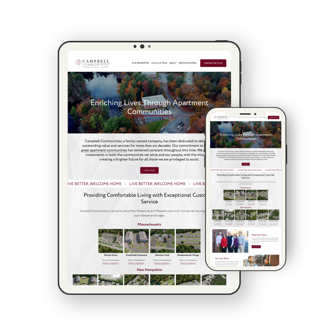 Responsive web design displayed on a tablet and smartphone showing a real estate company website with aerial images of a neighborhood with trees, houses, and roads.
