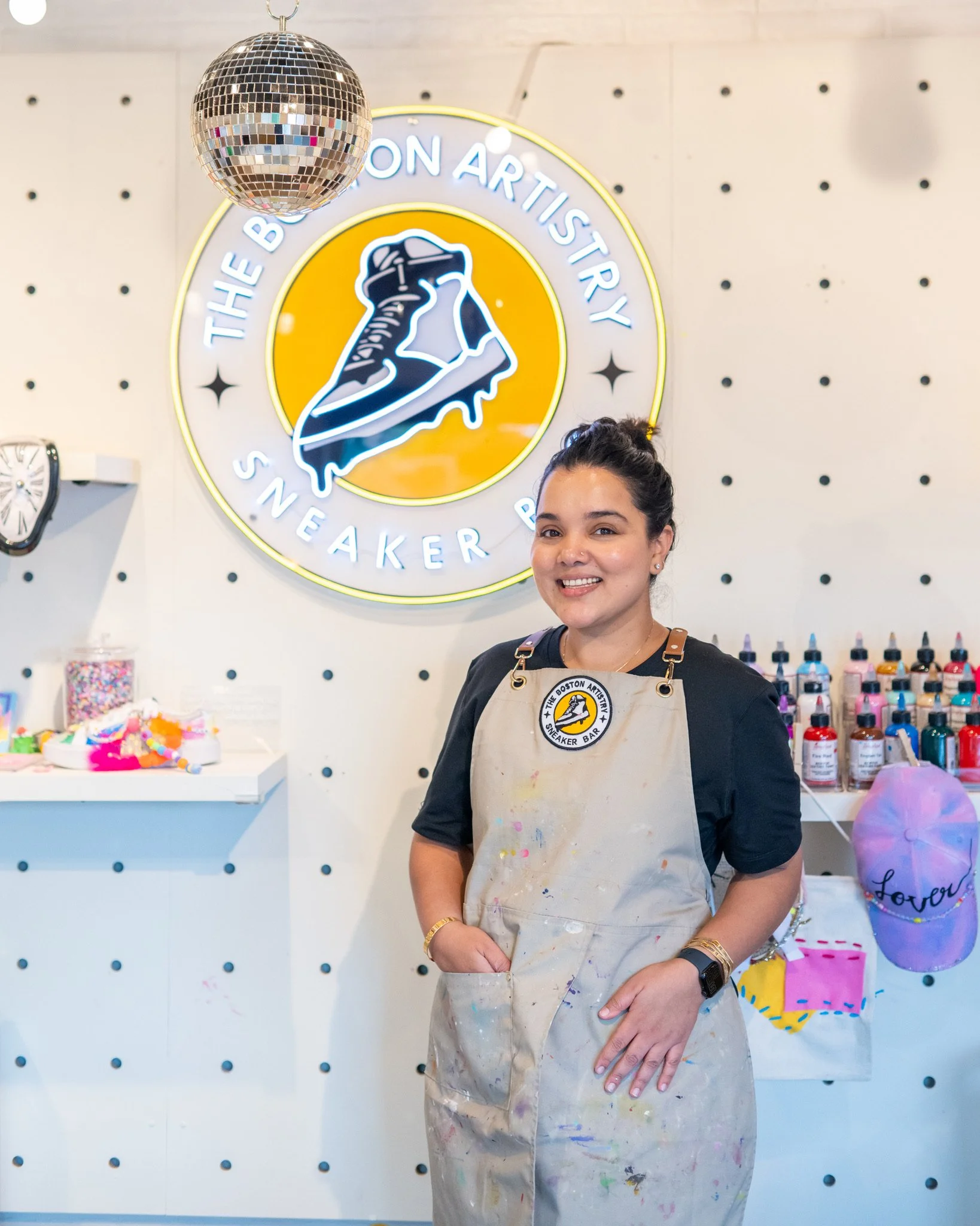 Nandita Singh Maan, owner of The Boston Artistry, inside her colorful Hingham art studio and sneaker bar.