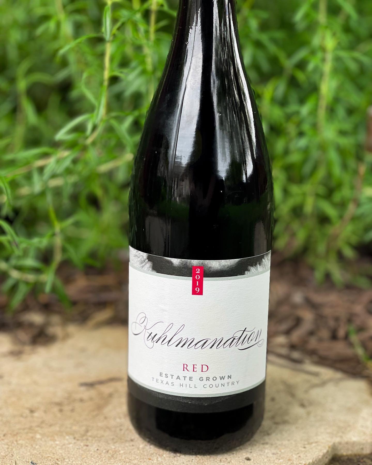 Our 2019 Estate Kuhlmanation Red is a blend of Carignan, Aglianico and Mourv&egrave;dre grown directly at our Estate.  On the palate, you&rsquo;ll enjoy notes of blackberry and blueberry fruit with firm tannins supported with good acidity. This wine 