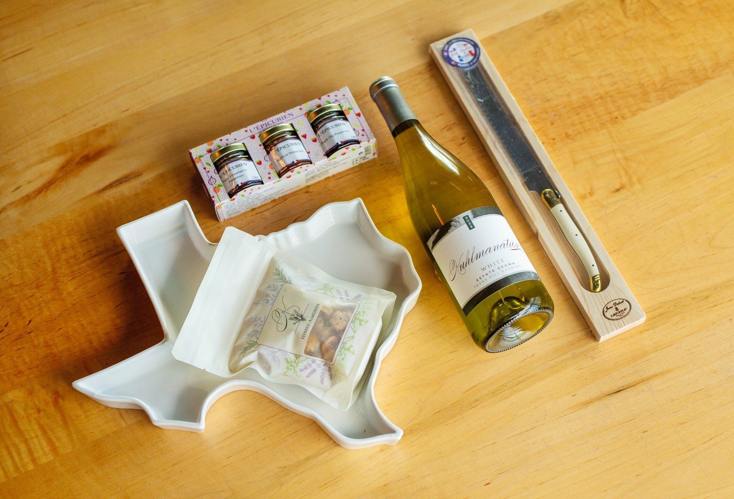 Come celebrate Mother's Day with us! Our Mother's Day Bundle includes a Texas platter, bread knife, jam set, 6oz bag of Herbed Almonds, and a bottle of our 2022 Estate White for $100. Plus, on Sunday, Moms get 50% off glasses of wines from a select m