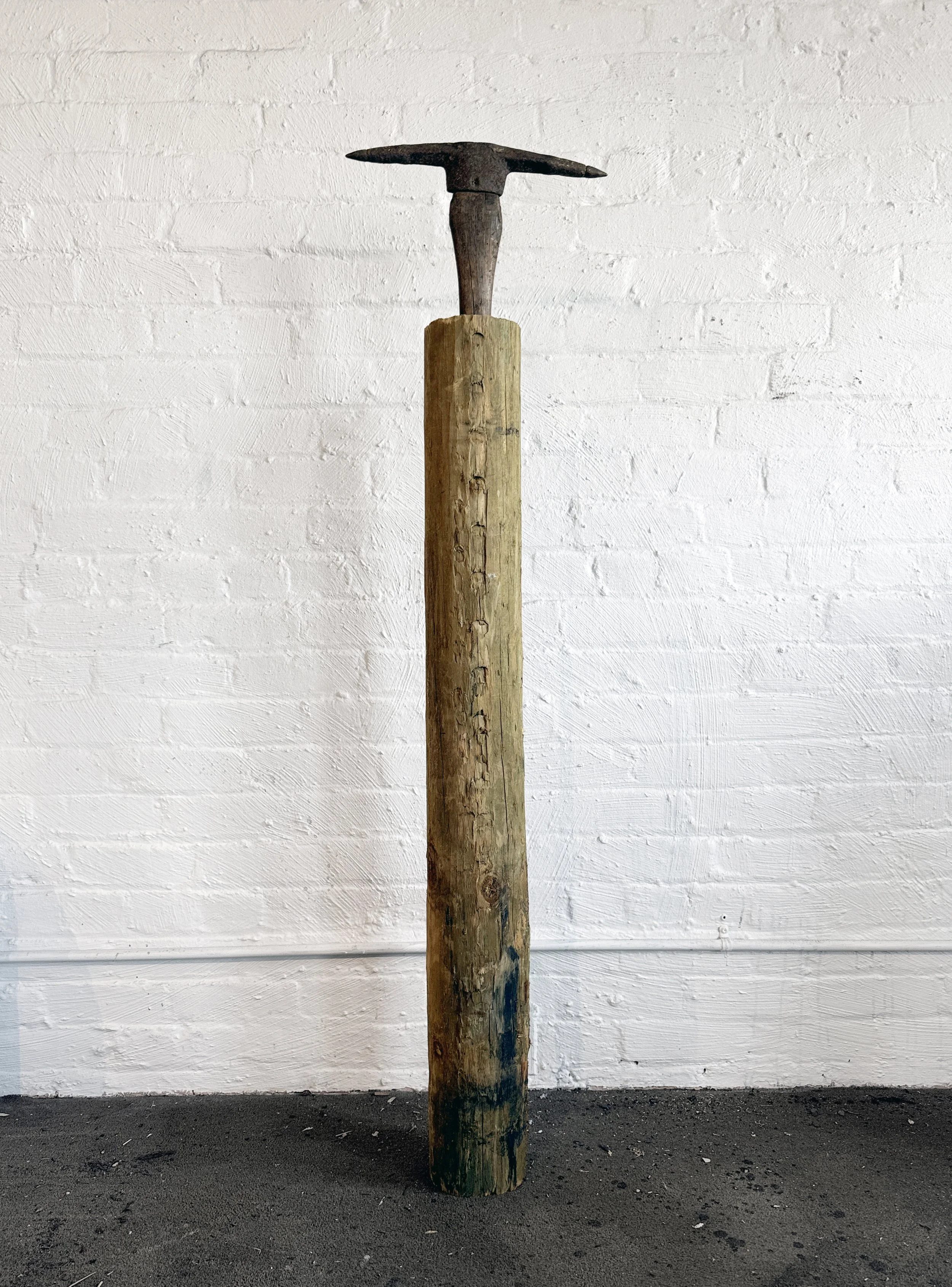 Haft Life (2026) | Found pickax, salvaged wood post, rust water, coal dust  | 60 x 16 x 6 in.  |  $1200