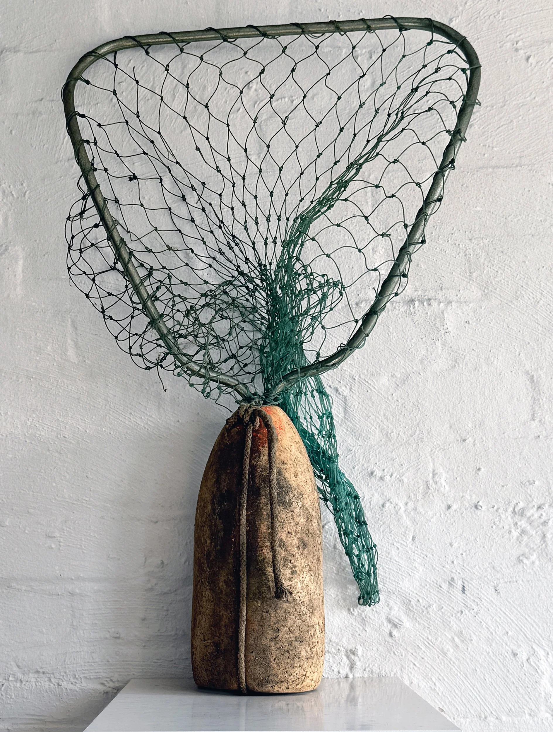 Catch / Release (2026) | Salvaged fishing net, metal, found buoy & dock line  | 25x20x8 in.  |  $1000