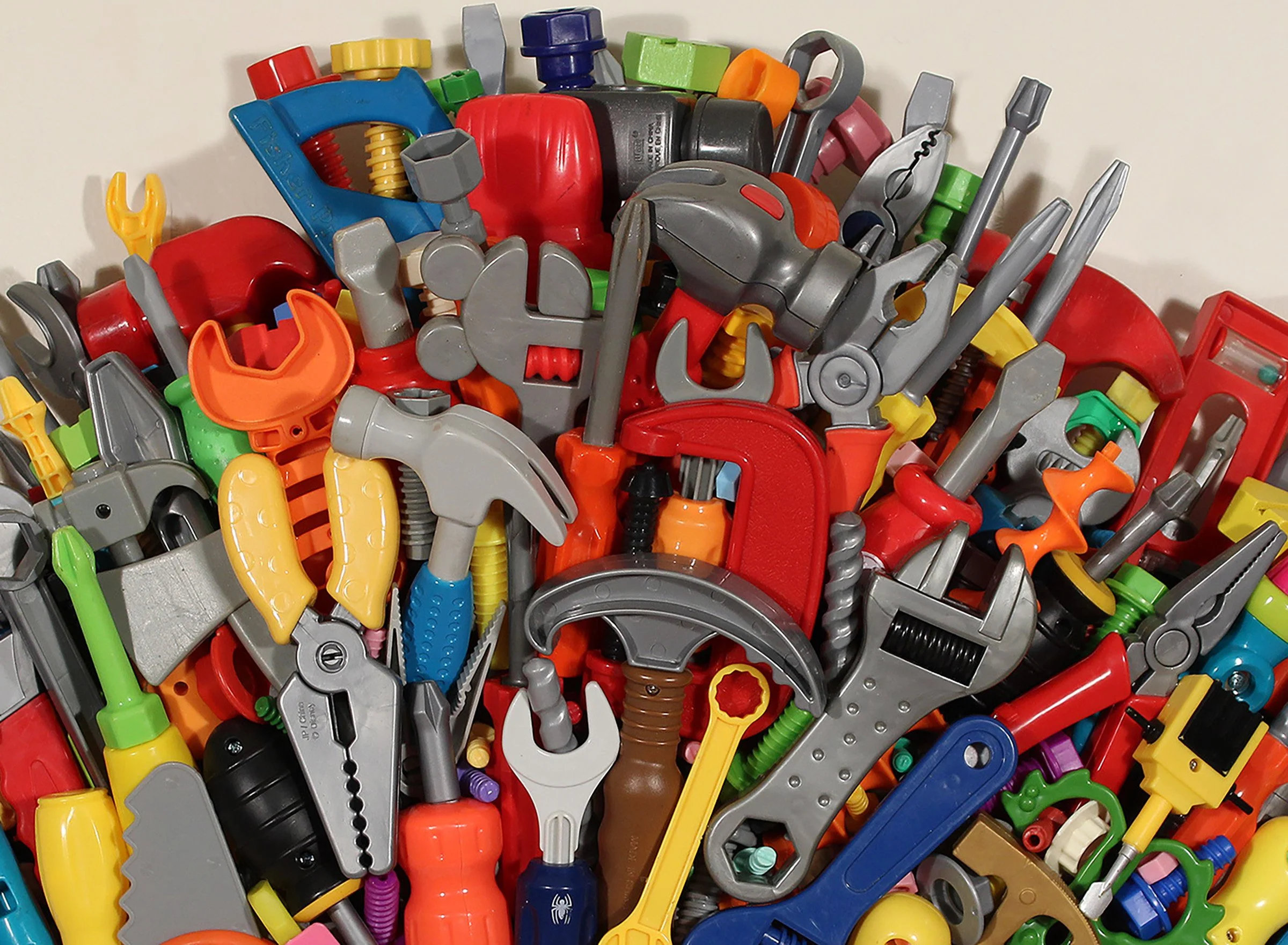 I CAN FIX IT (Detail), Found Toy Tools and Bolts, E6000, EZ Sculpt, Apoxie Sculpt, Plywood, 19”H x 28”W x 7”D, 2026