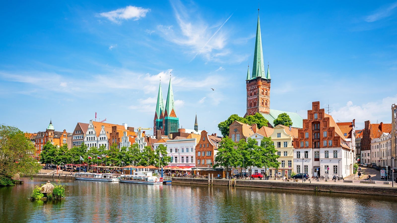Lübeck's Gothic churches, merchants' houses and dockyard warehouses, testament to its medieval maritime glory