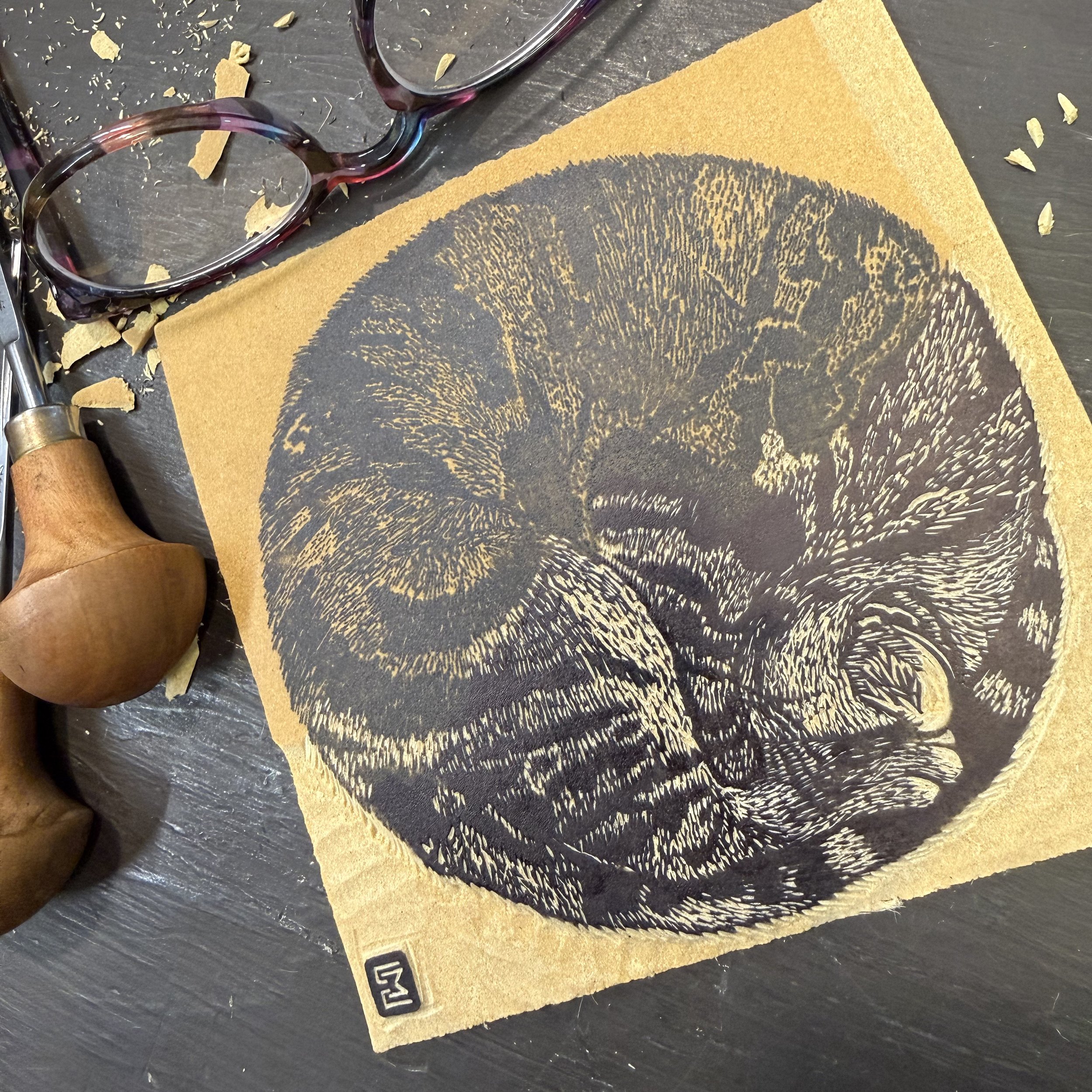 circle cat half carved.jpg