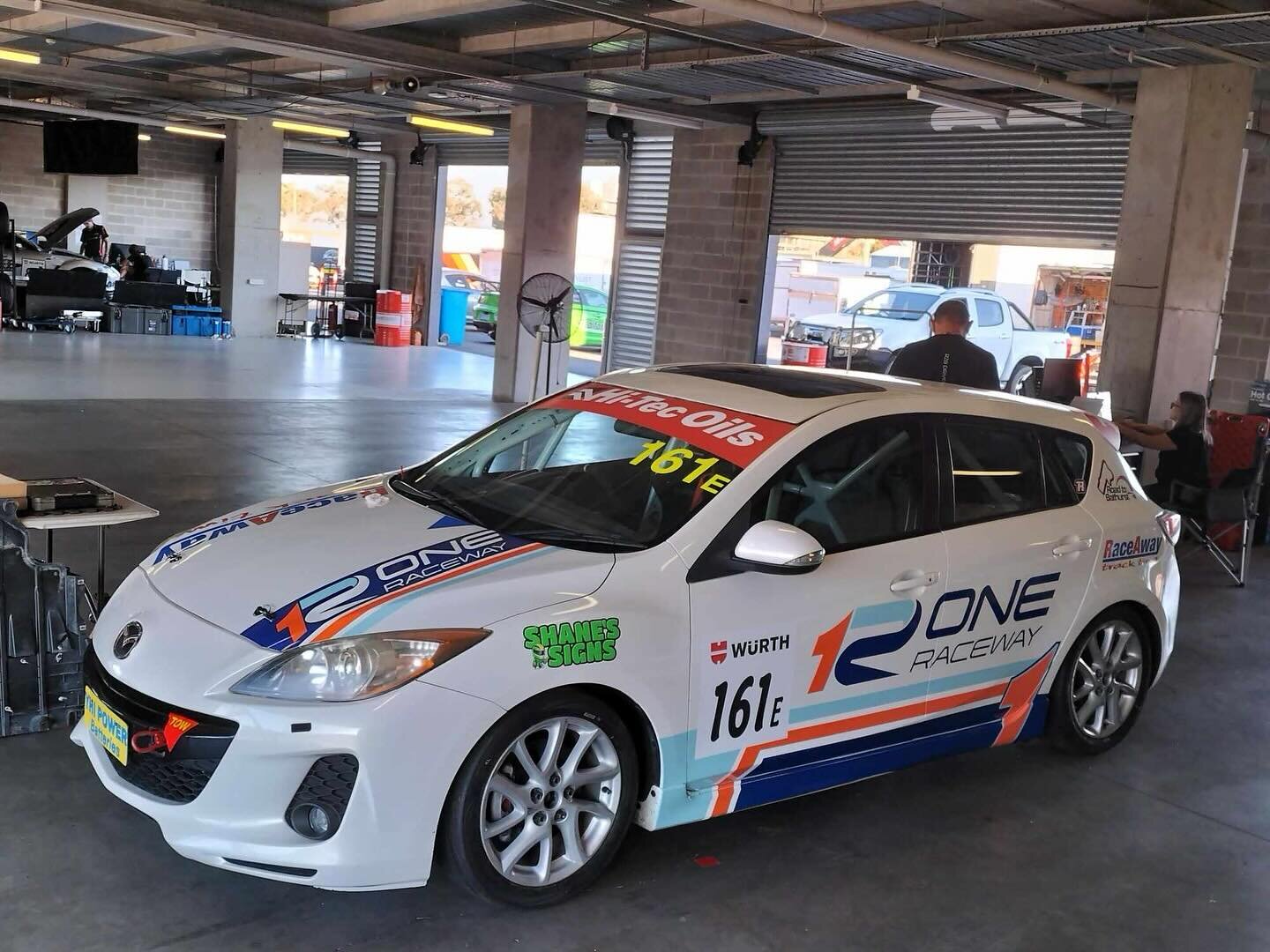 Well hello Mount Panorama 💪

Bathurst Day 1: Team and cars have arrived safely. Set up our garage and most importantly the food area for the team. Our new build got some lovely pyjamas thanks to @shanes_signs. We are stoked to be repping @oneraceway
