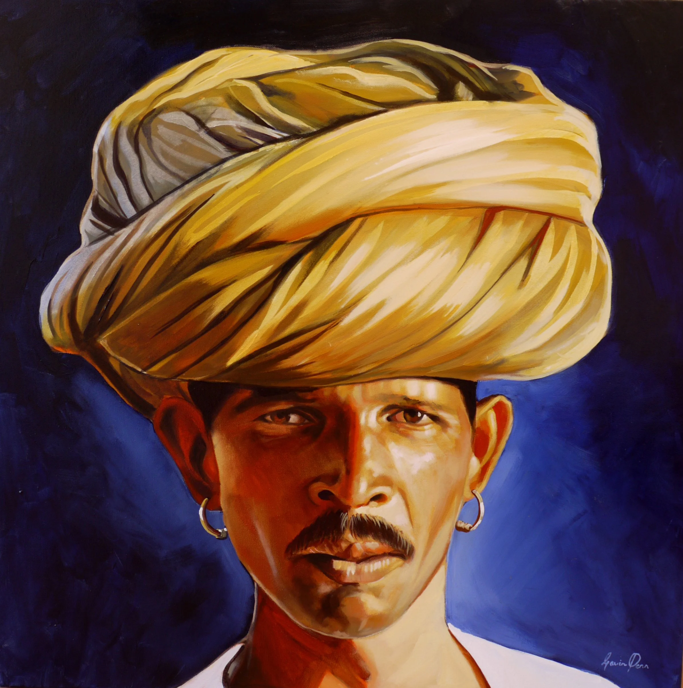 Close-up portrait of a man with dark skin, wearing a yellow headwrap and large hoop earrings, against a dark background.