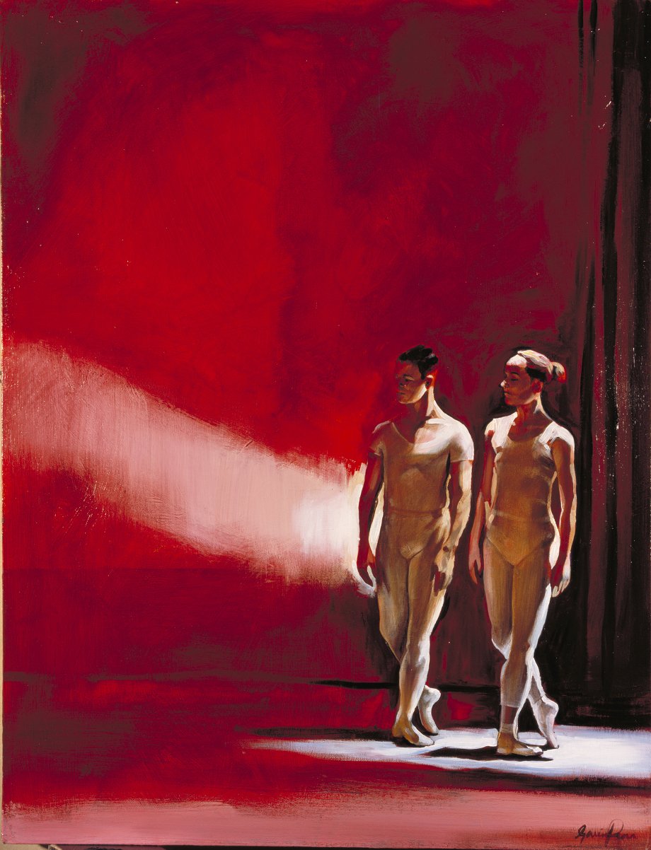 Two dancers in light-colored costumes rehearsing on stage with a red curtain and red background.