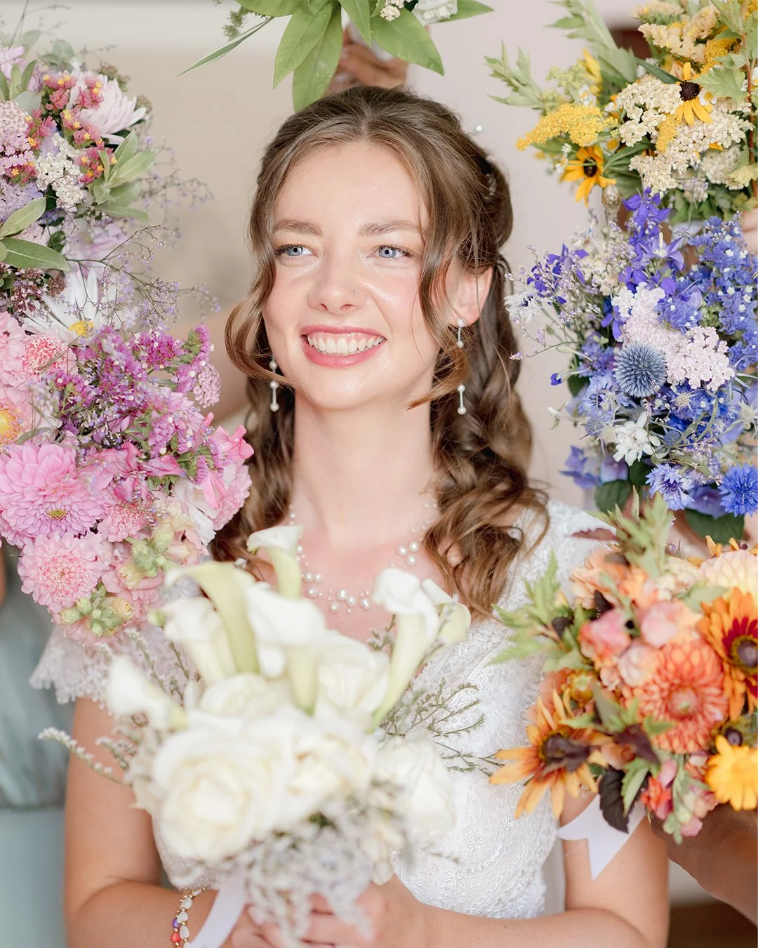 Bride flower portrait Devon wedding.jpg