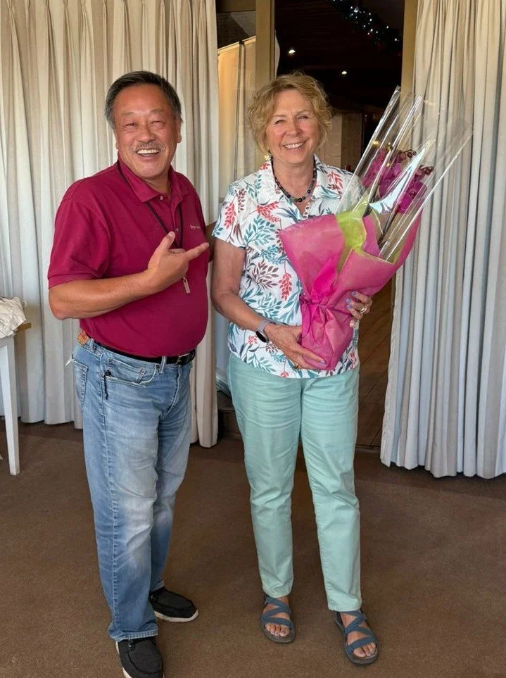 Meeting Dec 5 - Quiz winner gallantly gives his prize to Barbara, who came second