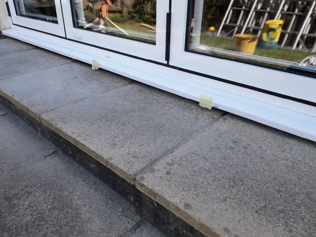 Patio door sill before.jpg