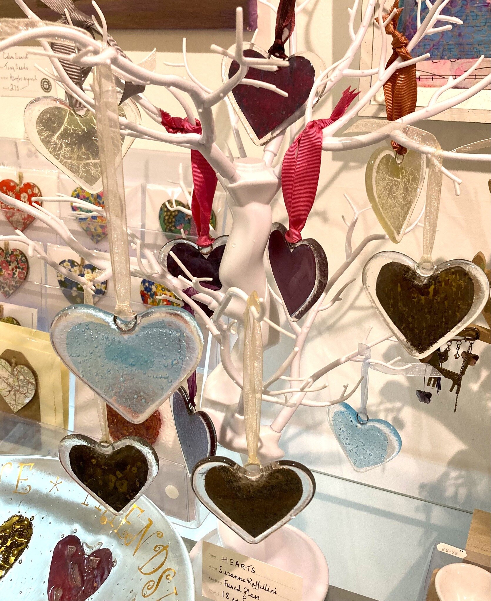 Money doesn't grow on trees, but LOVE does! :)
Glass hearts by Suzanne Raffellini.