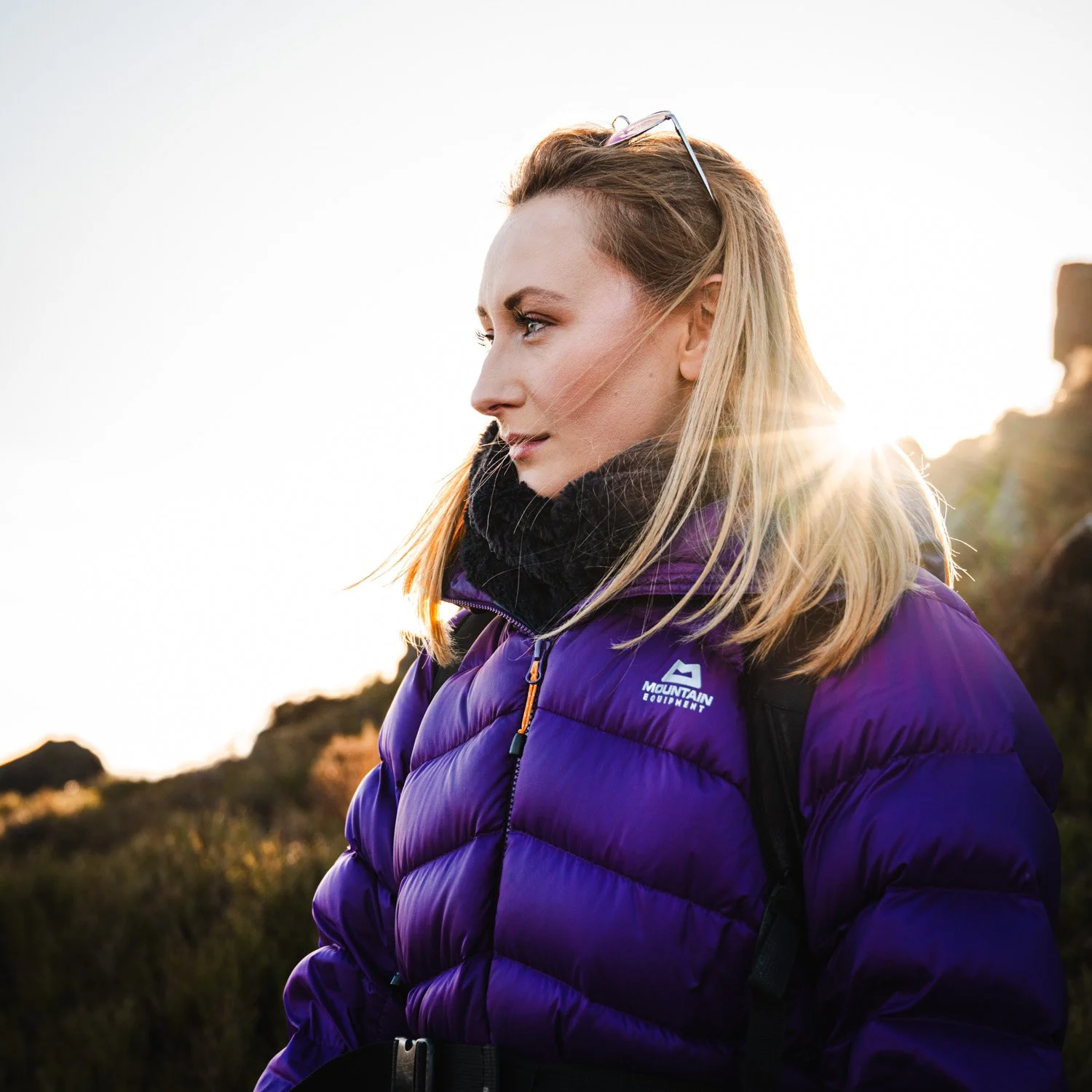 cinematic photo of girl wearing mountain equipment jacket