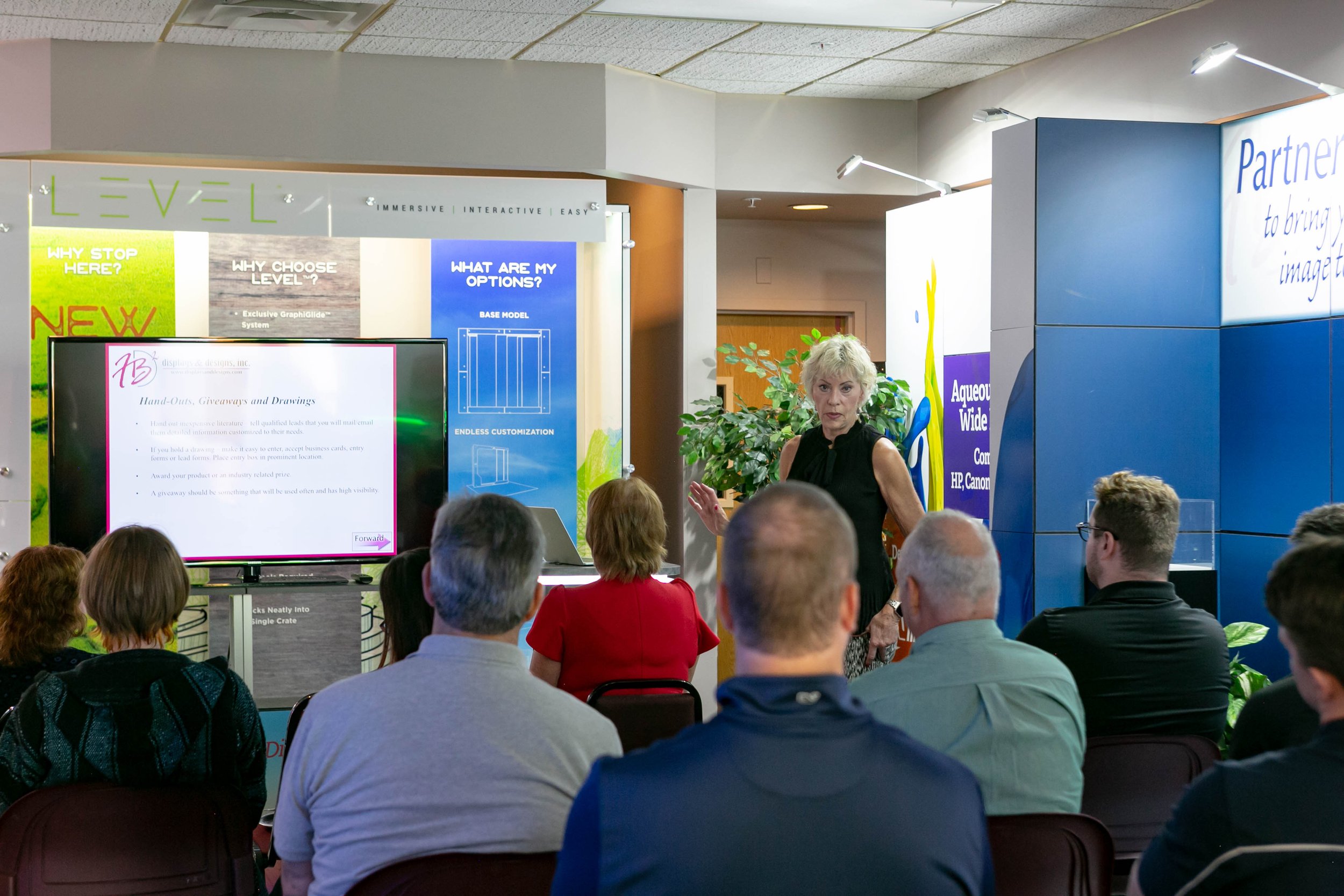 Francine leads a Seminar about trade show etiquette