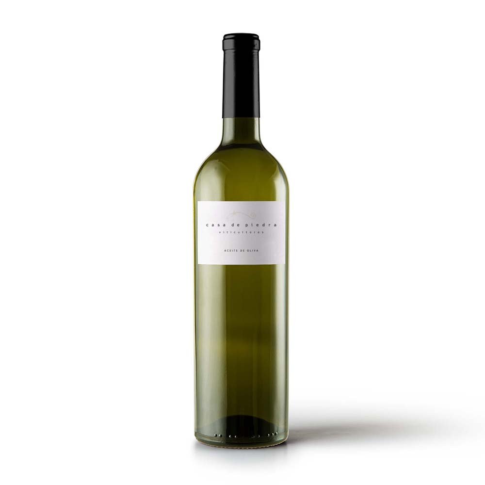 Green wine bottle with a white label and black cap on a white background.
