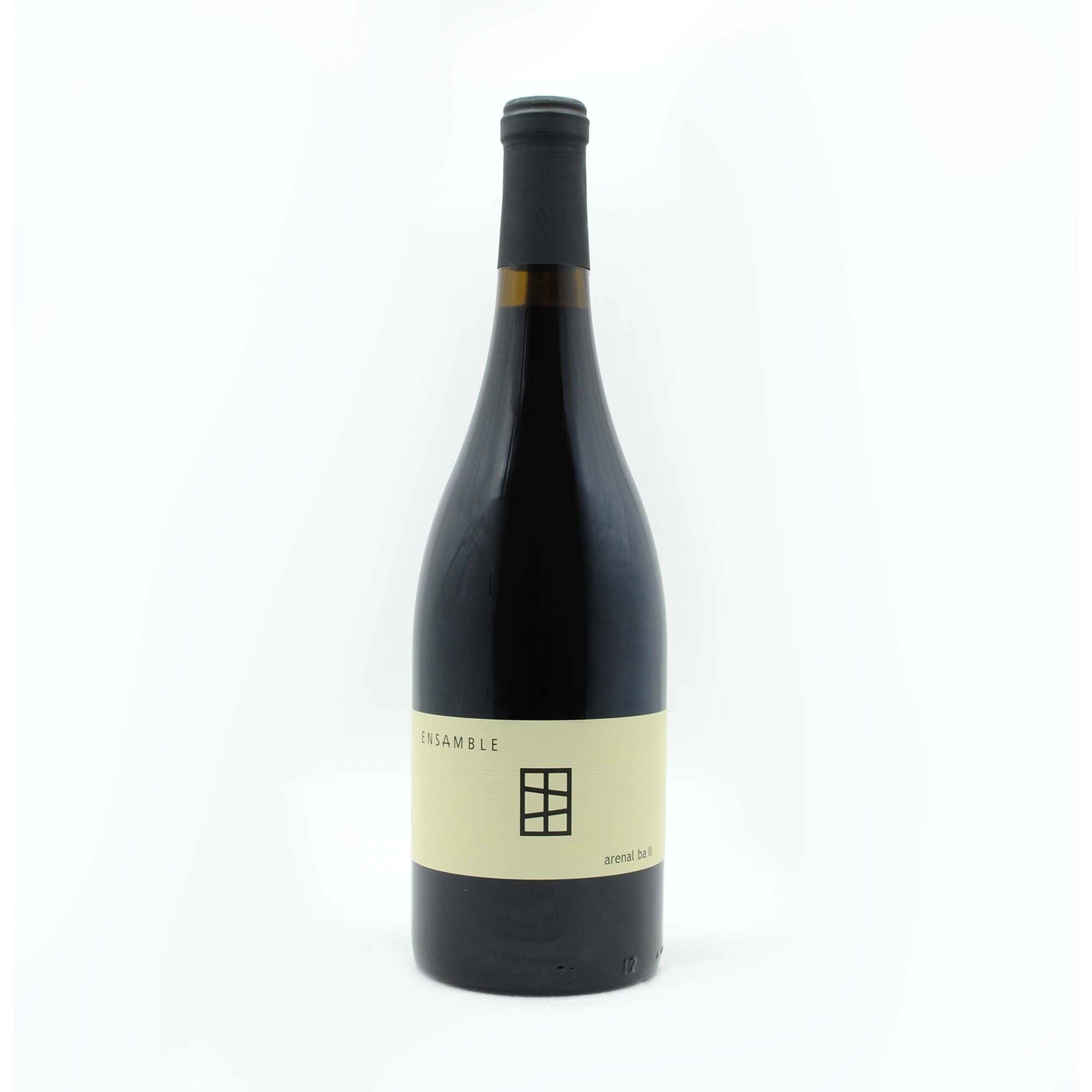 A black wine bottle with a cream label that reads 'ENSEMBLE' and some small text, standing against a plain white background.