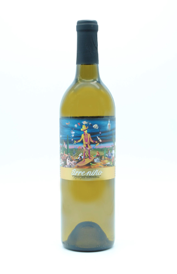 A bottle of white wine with a colorful label featuring a woman in a pink dress and hat, standing on a path with mountains, animals, and blue sky in the background.