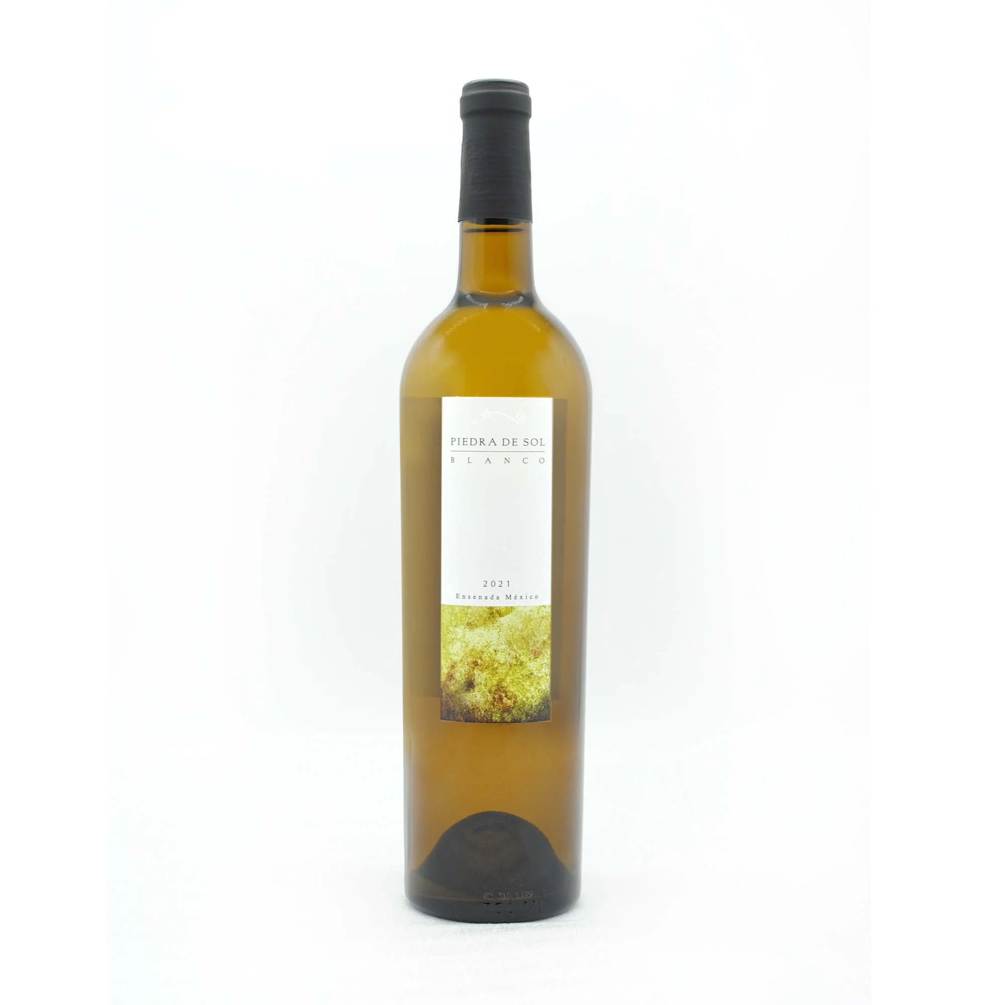 A bottle of white wine with a black cap, labeled 'Piedra de Sol Blanco 2021 from Ensenada, Mexico'.