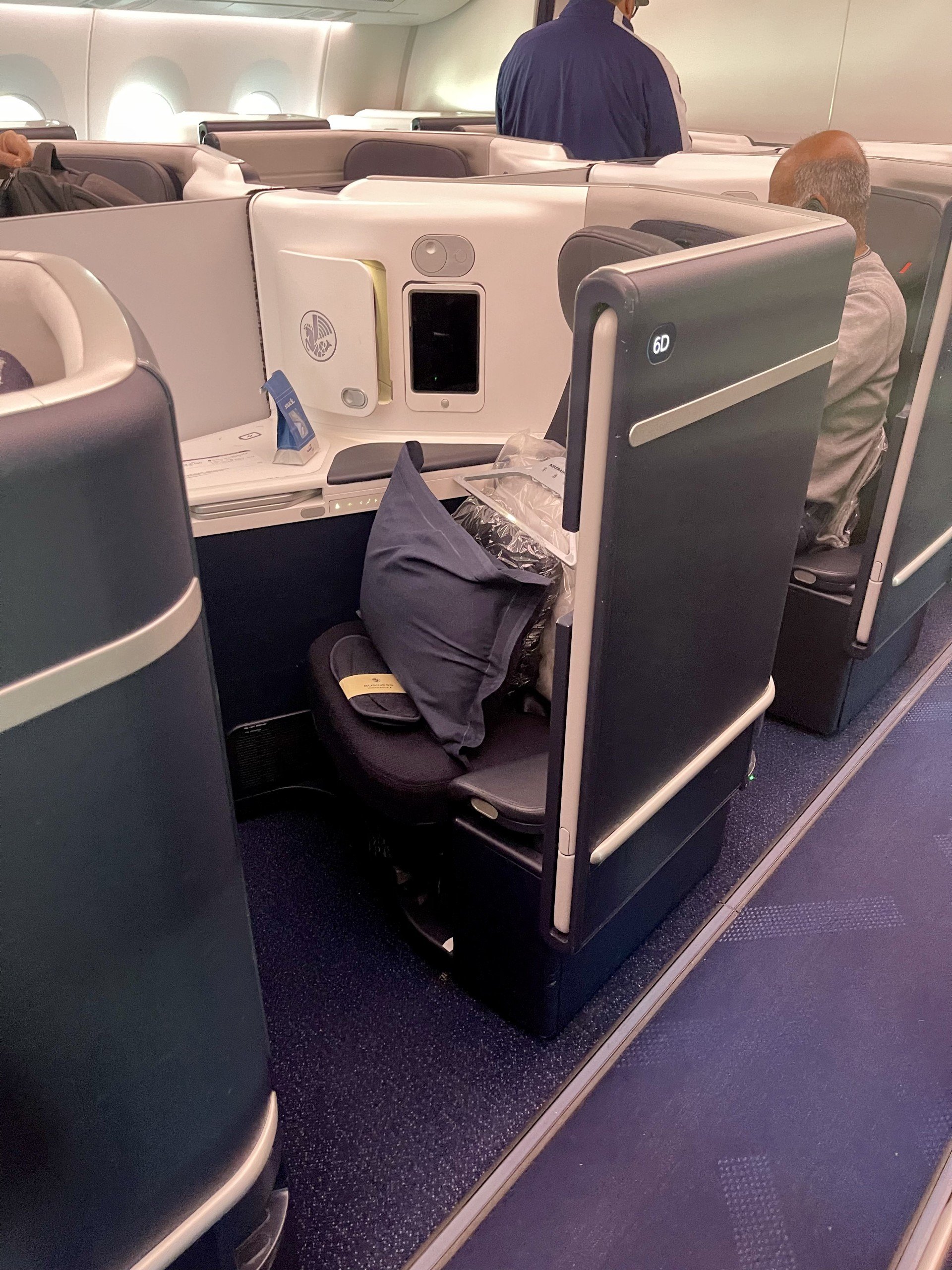 Air France A350 business class lie-flat seat with pillow and blanket