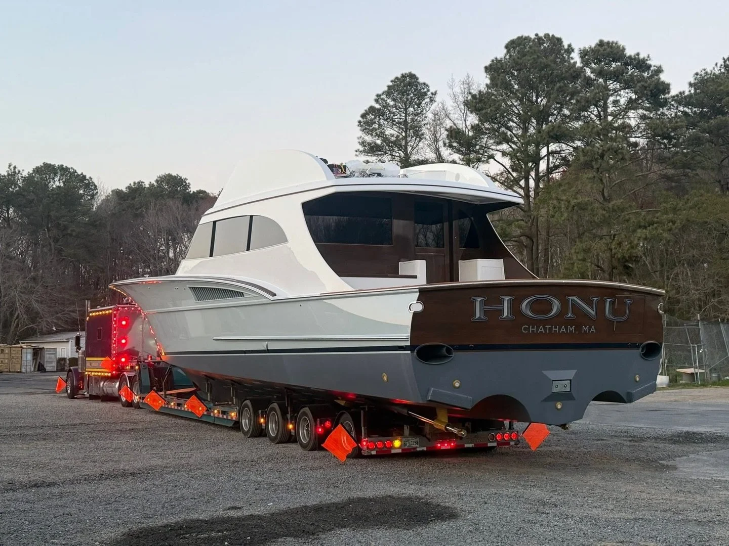 Meet the 64' Titan 'HONU'! This beast made its debut in Ocean City, MD, with a nighttime delivery to Sunset Marina, complete with police escorts and a support crew. Measuring 19-1 tall, 18-7 wide, and weighing 85,000lbs, thanks to @boat_hauler (Arrig