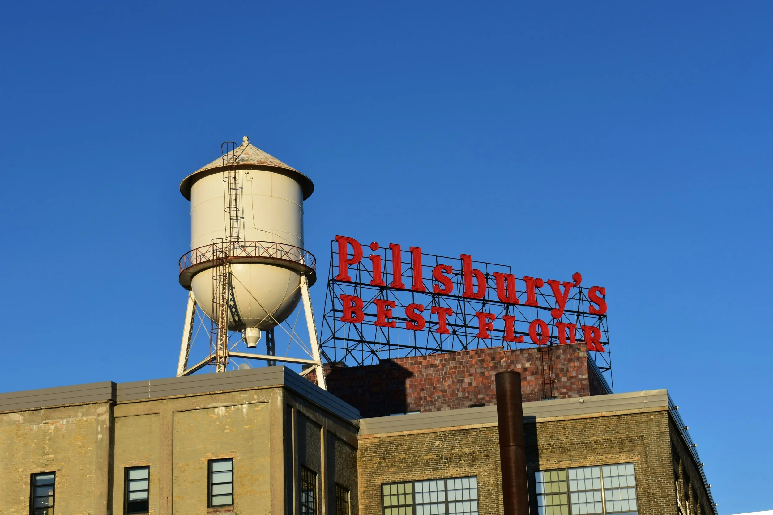 The sign for Pillsbury’s Best Flour beside a water tower in Mill City, Minneapolis