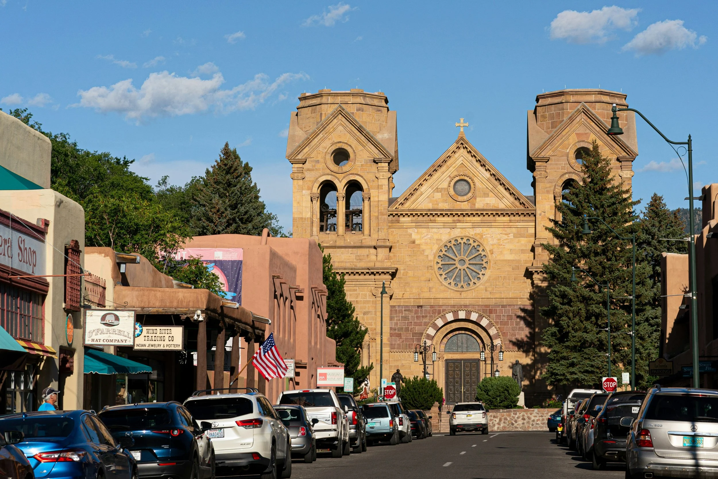 The Cathedral Basilica of St. Francis of Assisi in Santa Fe has two small belltowers and a large circular window above its doors