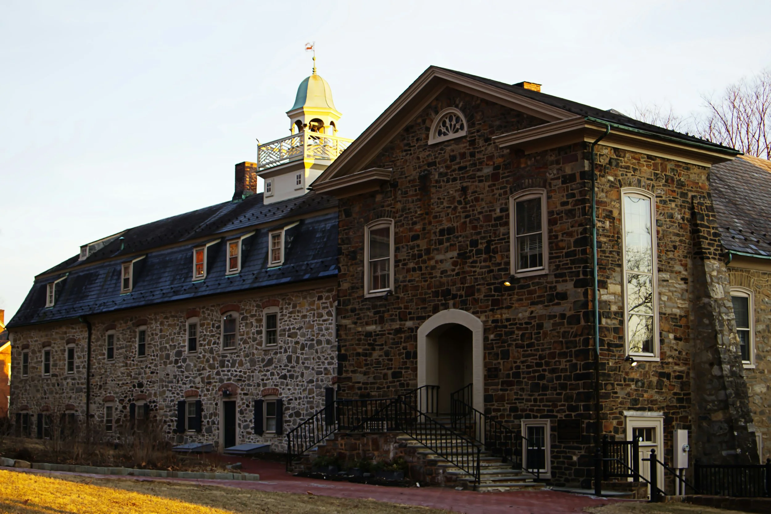 An old stone building with a small bell tower on Bethlehem, PA.