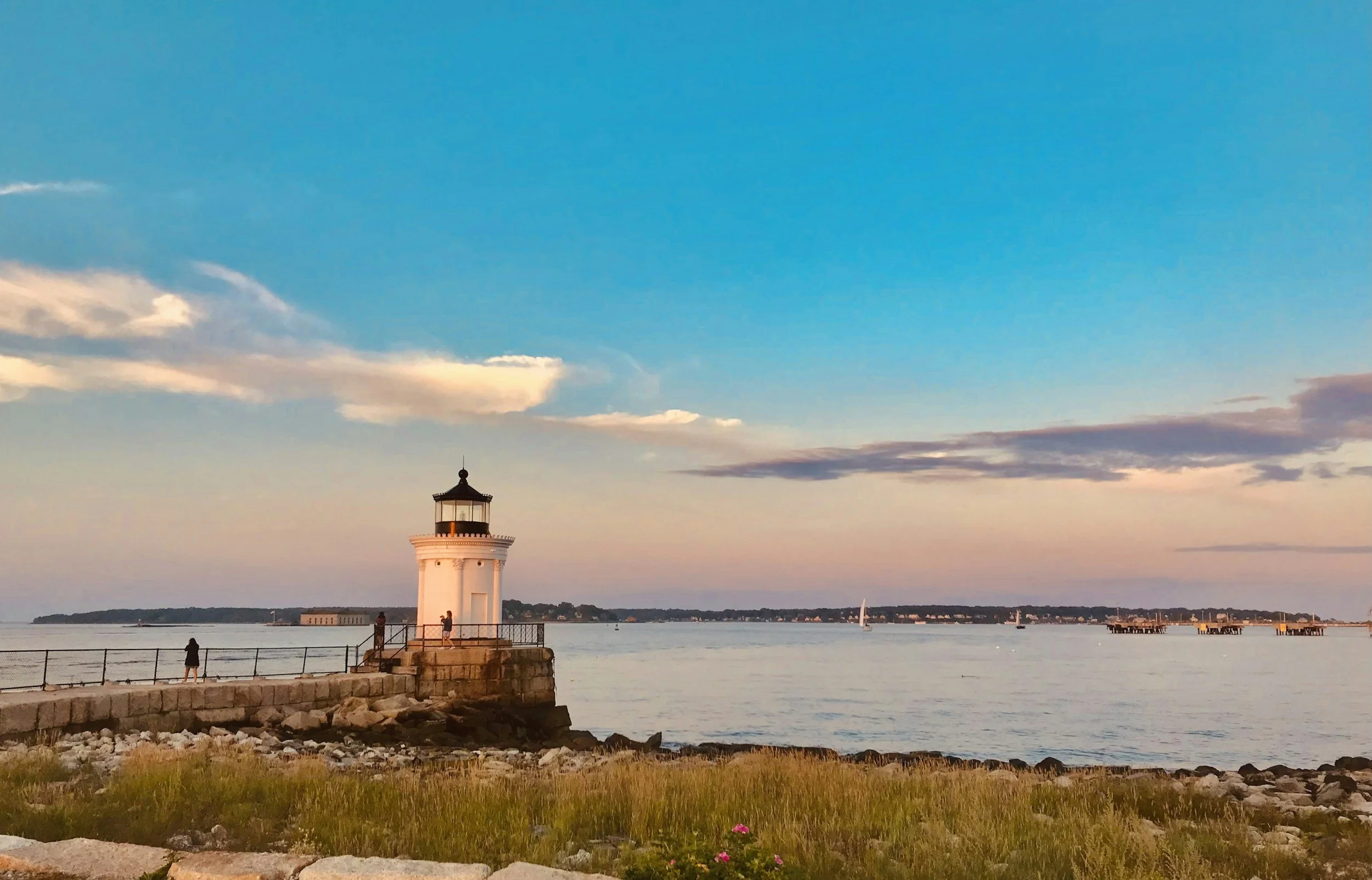 Brant Point Light on Nantucket with the ocean behind at sunset