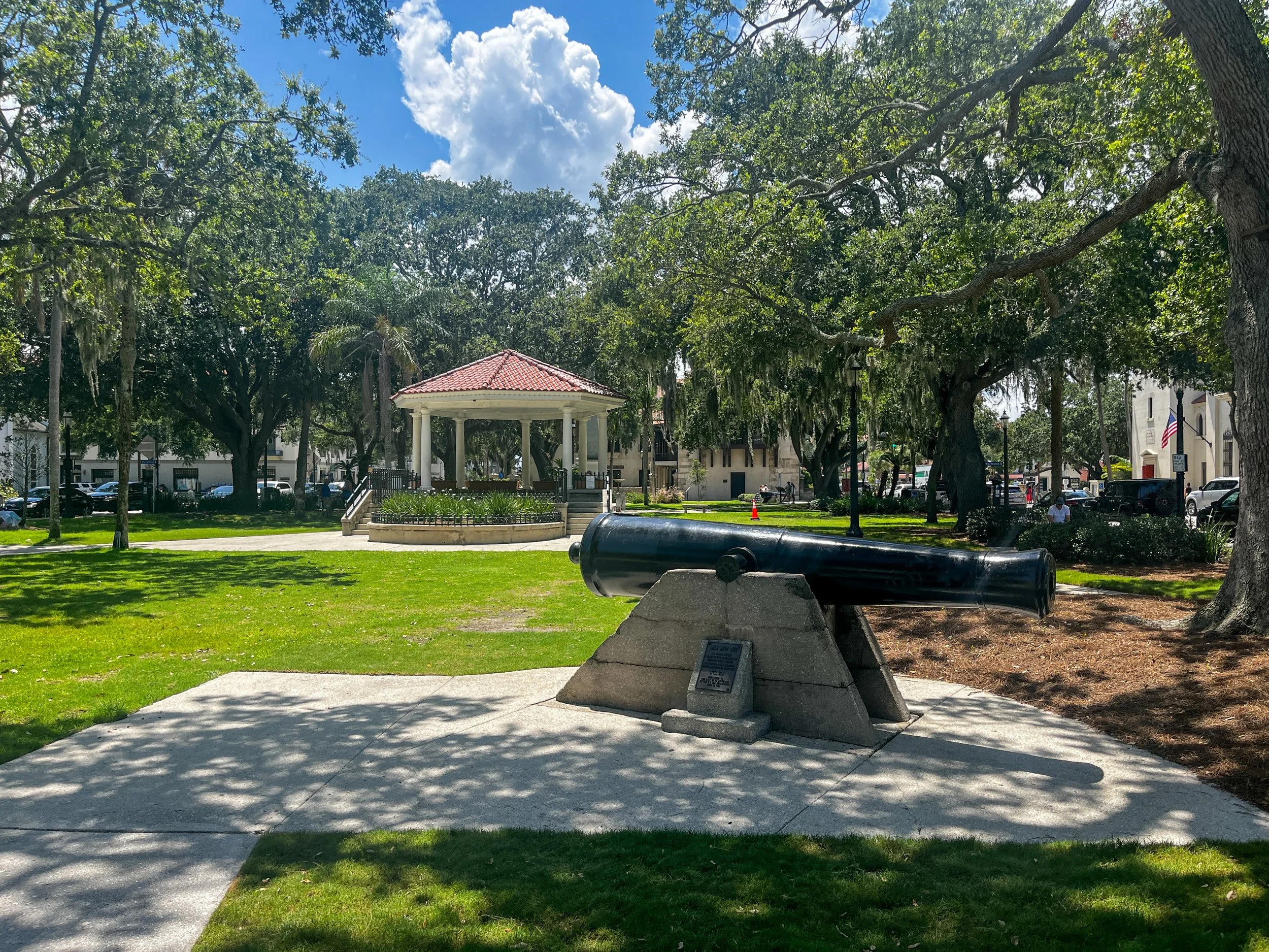 A cannon and bandstand in a quiet park on a sunny day. Drives & Detours St. Augustine local tips