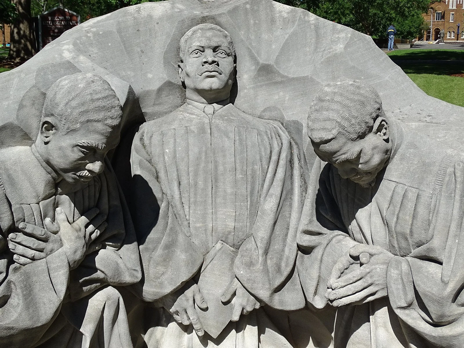 The Three Kneeling Ministers Statue in Kelly Ingram Park, Birmingham shows ministers praying during a Civil Rights Demonstration