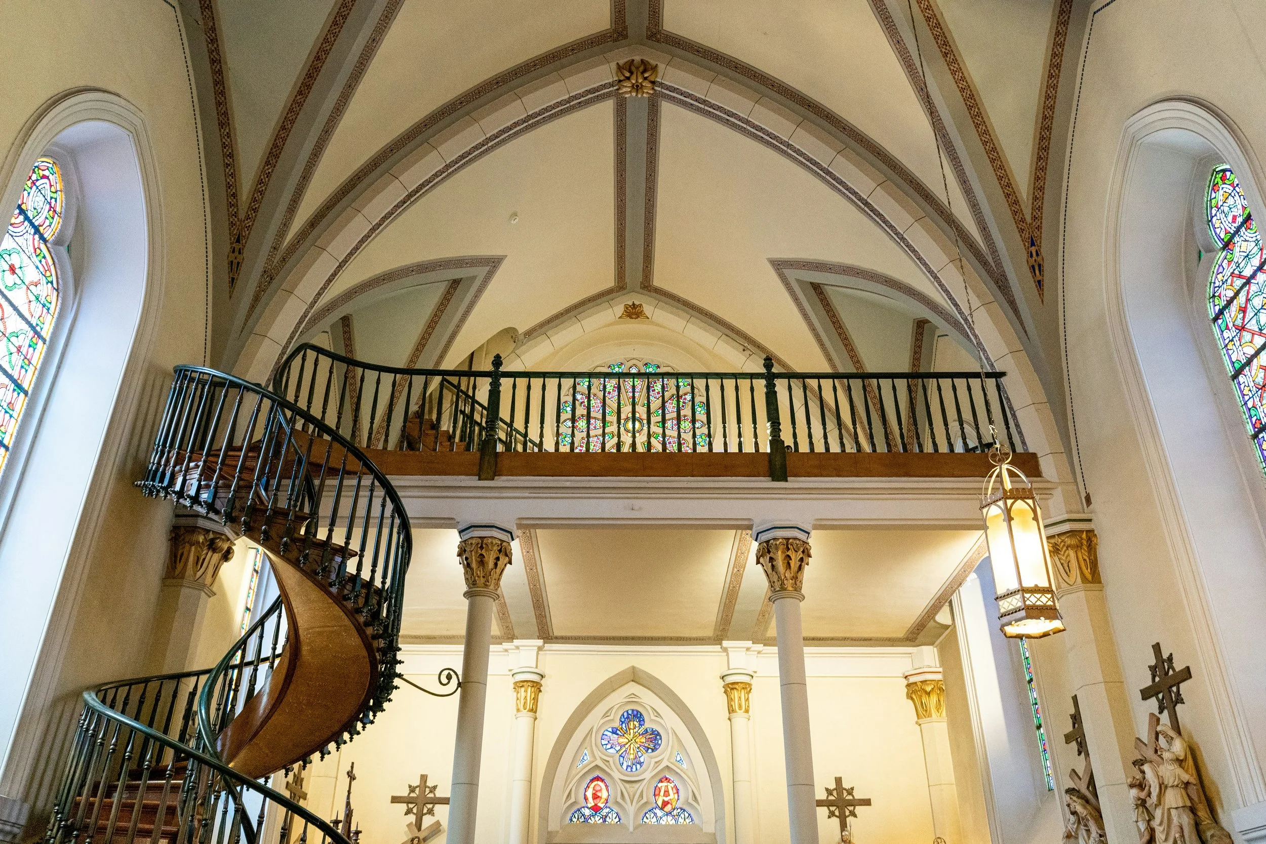 The beautiful interior of Loretto Chapel and the Miraculous Staircase in Santa Fe, NM