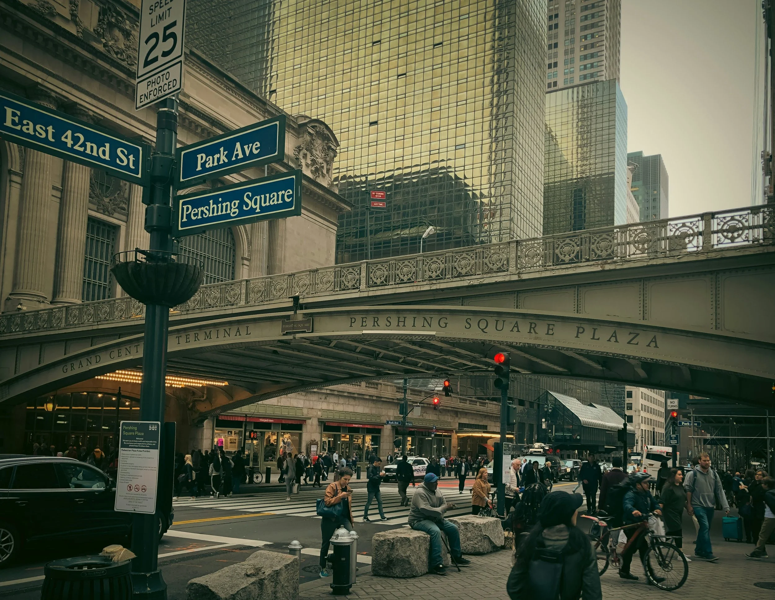 The streets outside Grand Central Station. Its very busy with people walking and driving everywhere. Drives & Detours NYC local tips