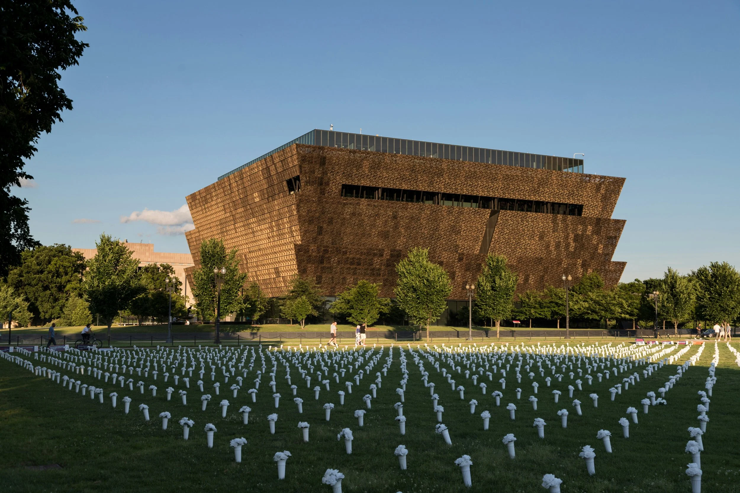 The bronze exterior of the National Museum of African American History and Culture on the National Mall in Washington D.C.