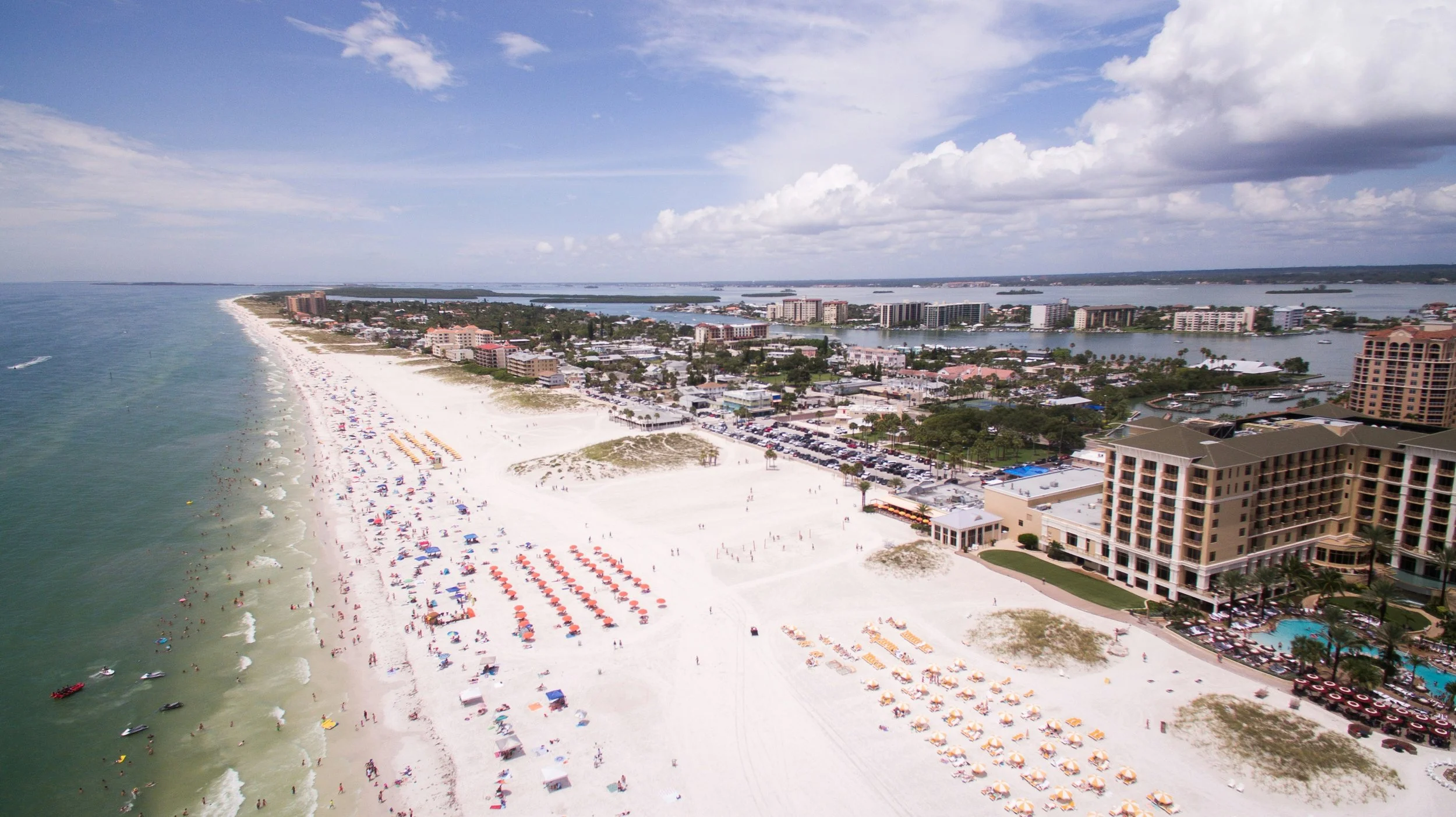 An aerial shot of a busy beach near Tampa, Florida. Drives & Detours Tampa local tips