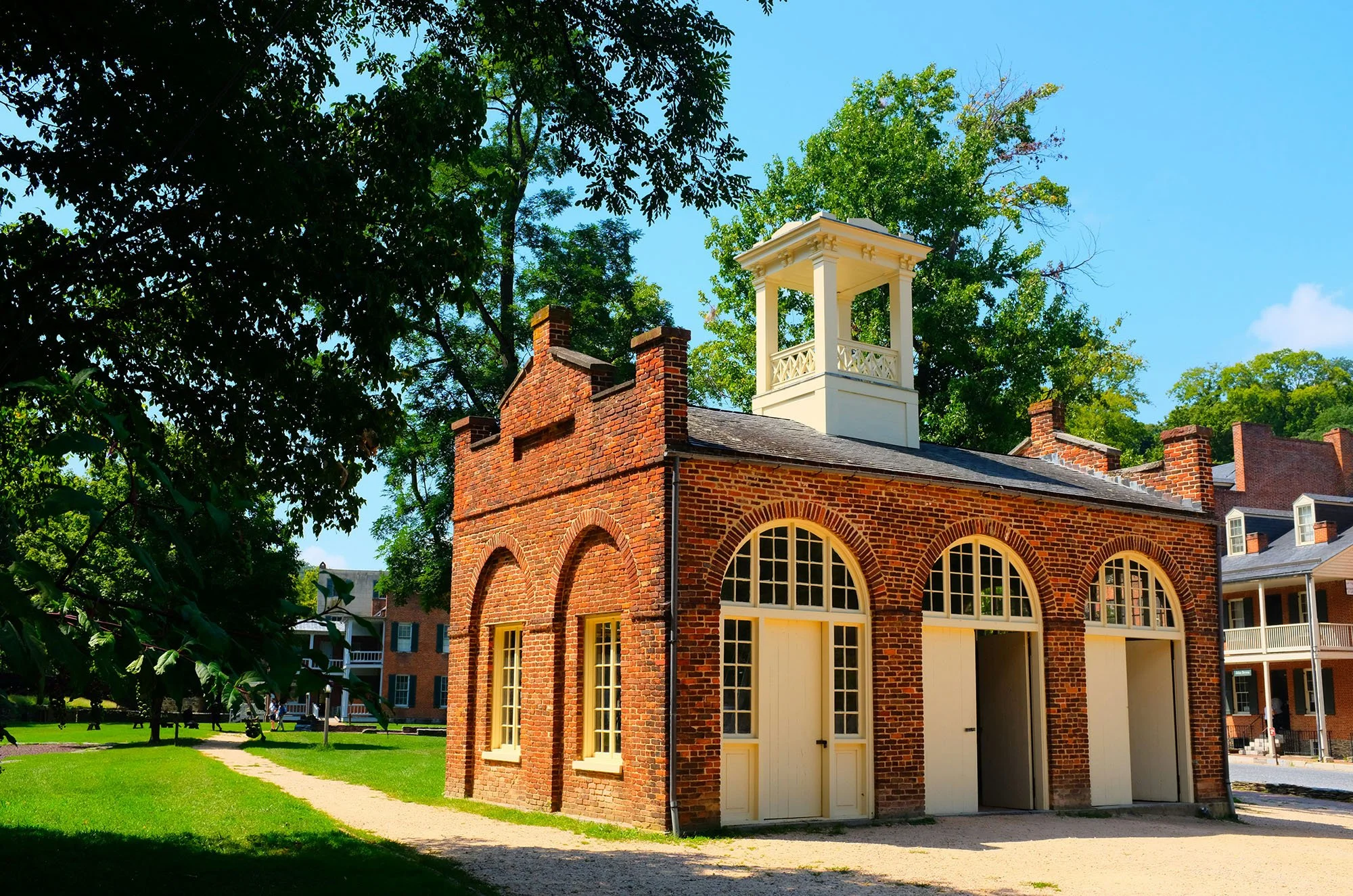 John Brown's Fort is a small red brick firehouse with white wooden doors and a little lookout. Drives & Detours Harpers Ferry self-guided tour