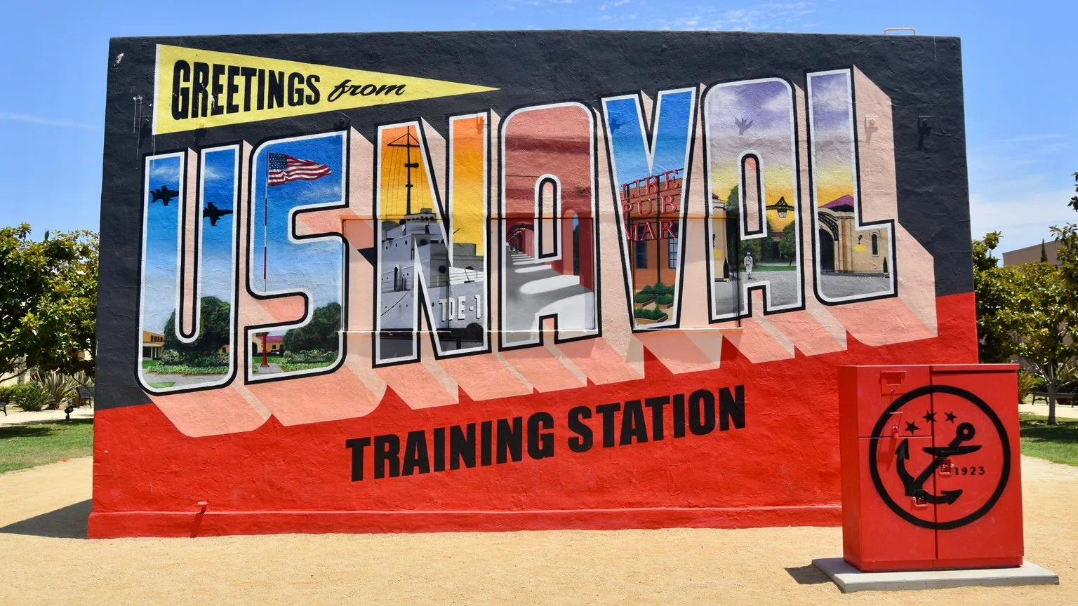 The Greetings From Liberty Station Mural, which shows different aspects of naval training in the words "US NAVAL", written in large block lettering