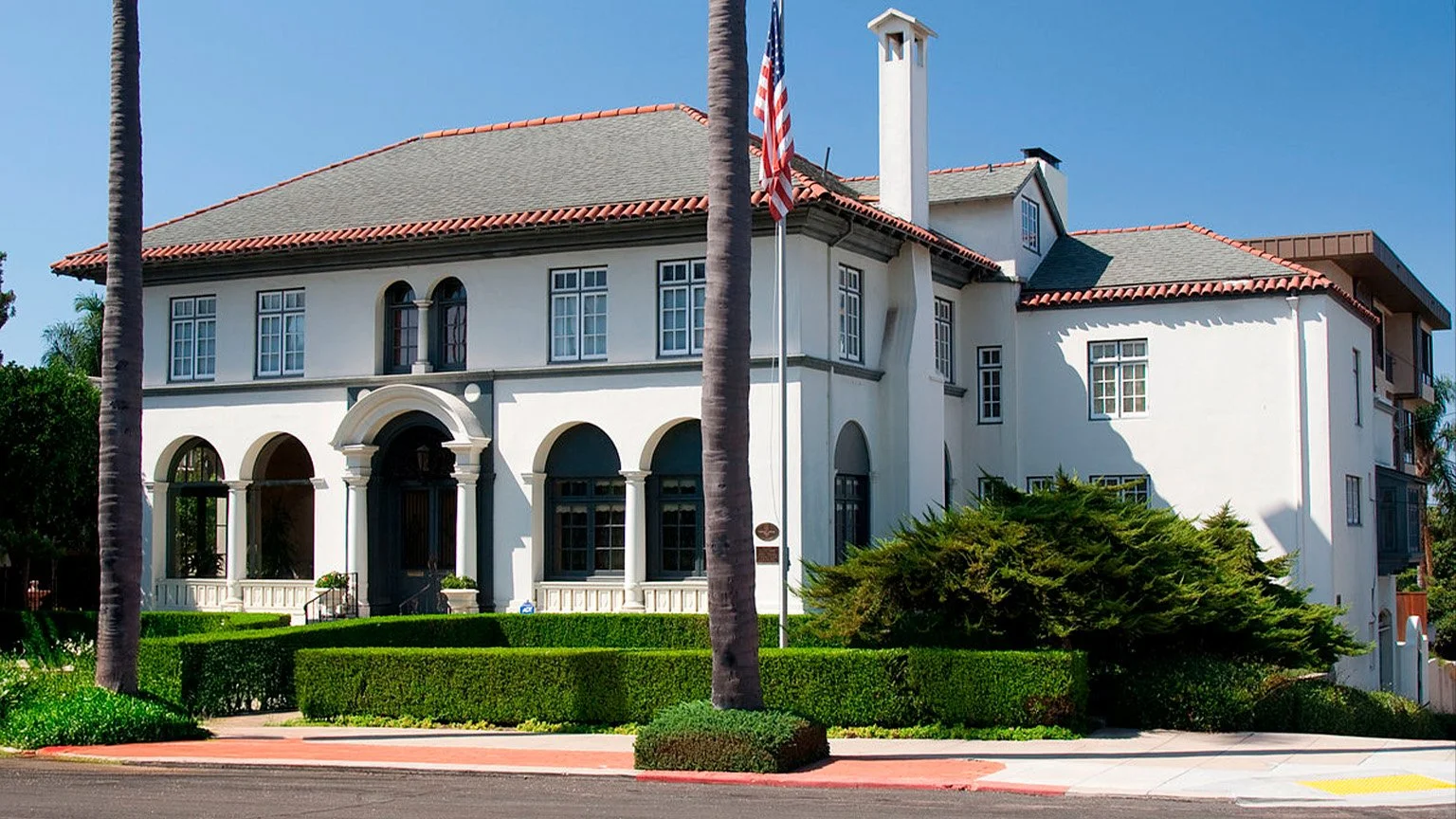 The Coulter House in Bankers Hill, San Diego. It's huge and painted white. An American flag flies outside on a flagpole