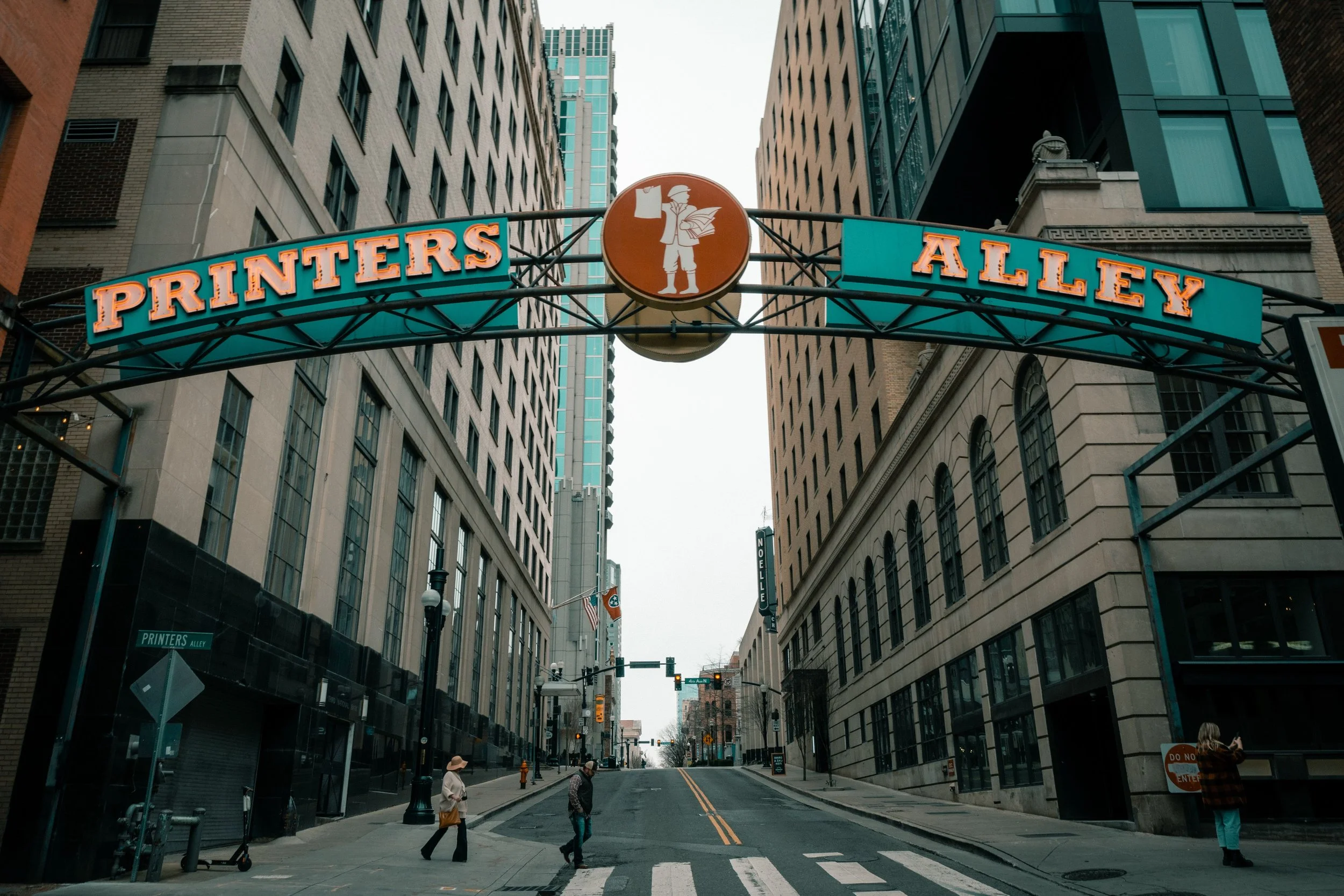 The sign of Printer’s Alley over a street in Nashville