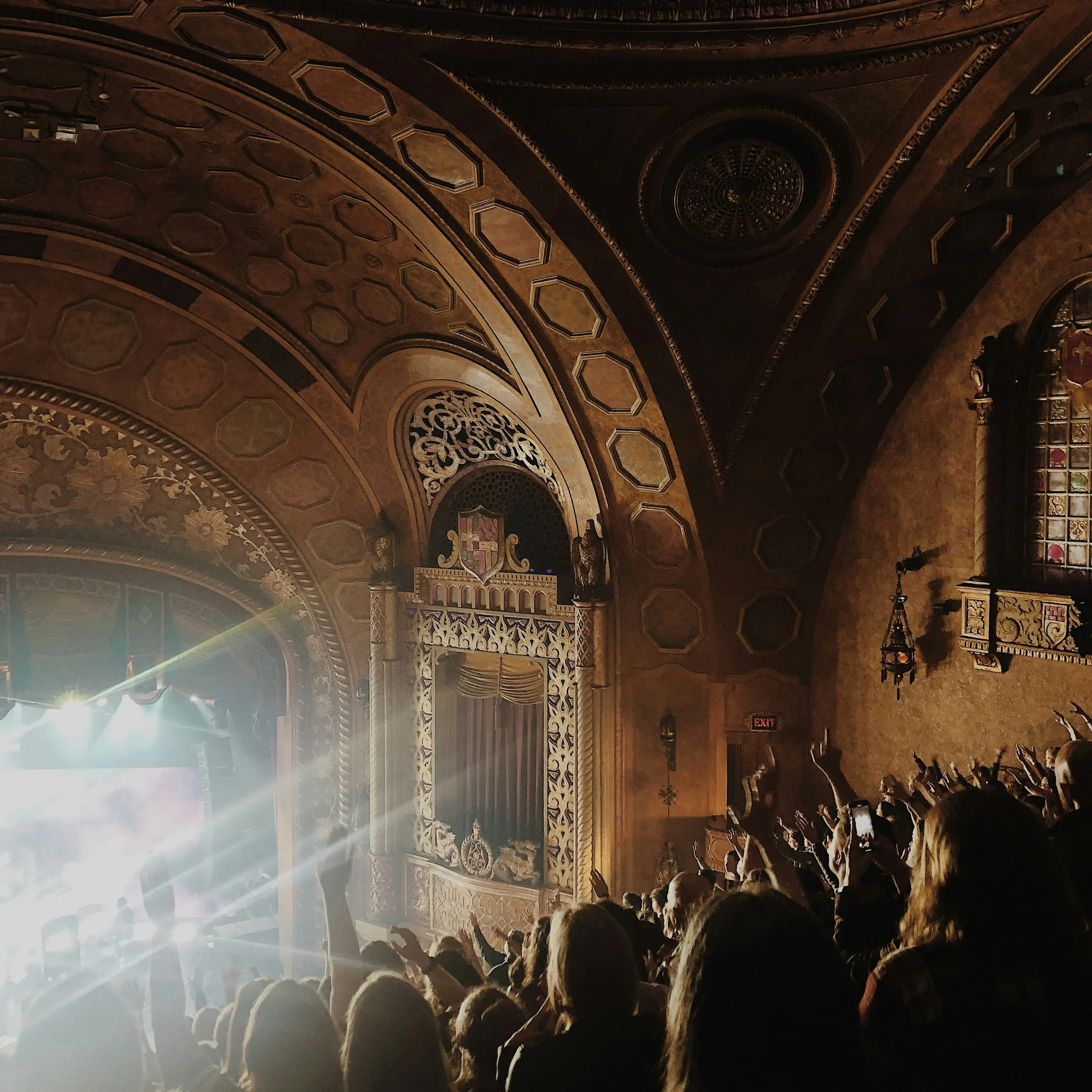A crowd watches a band play in a music hall in Birmingham, Alabama