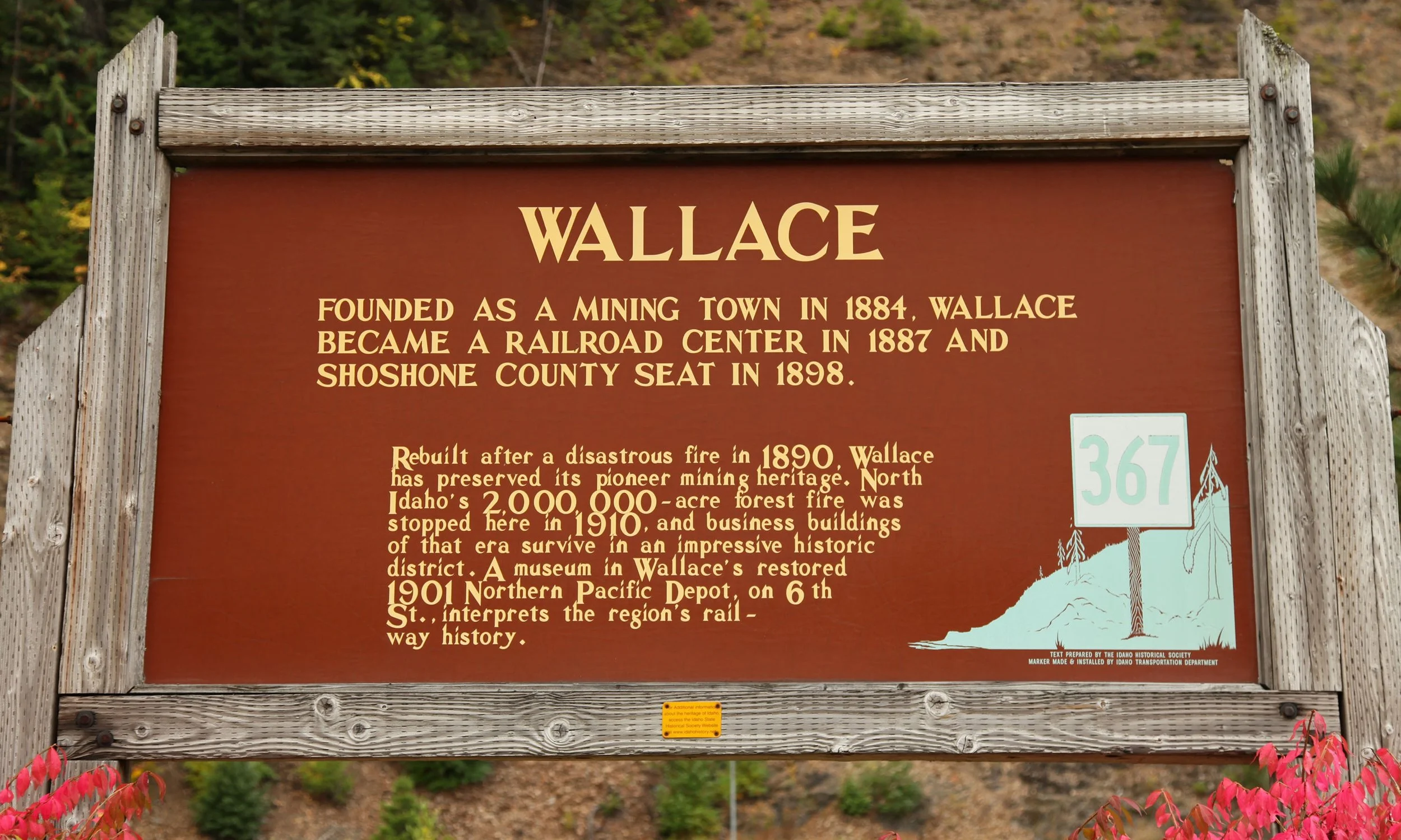 A historic marker in Wallace that gives some details about the town, such as how it was founded as a mining town in 1884