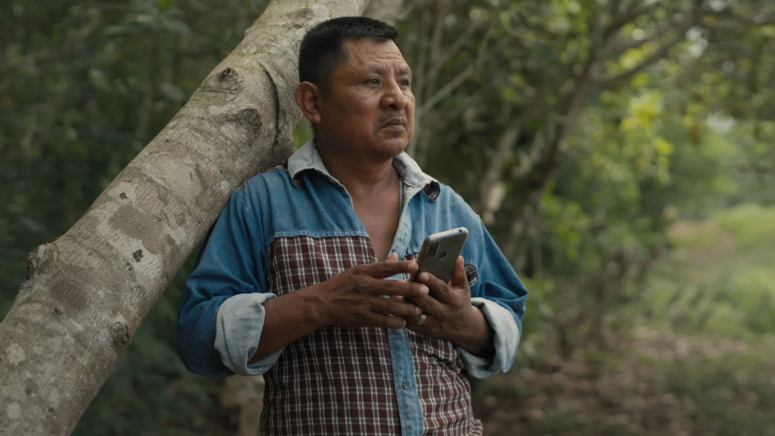 Miguel-Leaning-on-Tree-3.webp