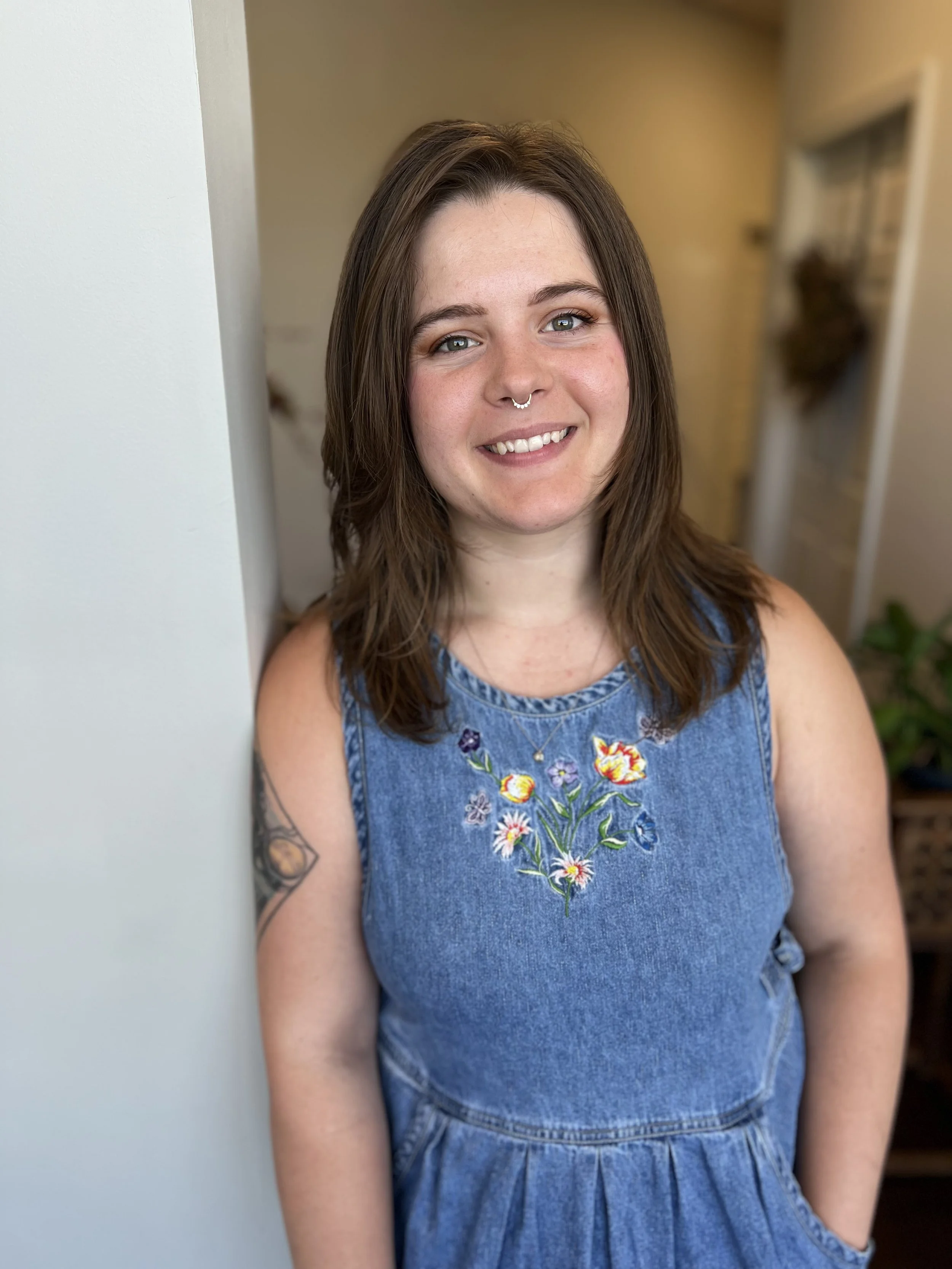 Meet Sydney Wilson! Stylist specializing in corrective color, blonding, long and short hair, curly hair, extensions, and gender affirming cuts at the Hair Artistry Collective in Morgantown, WV.