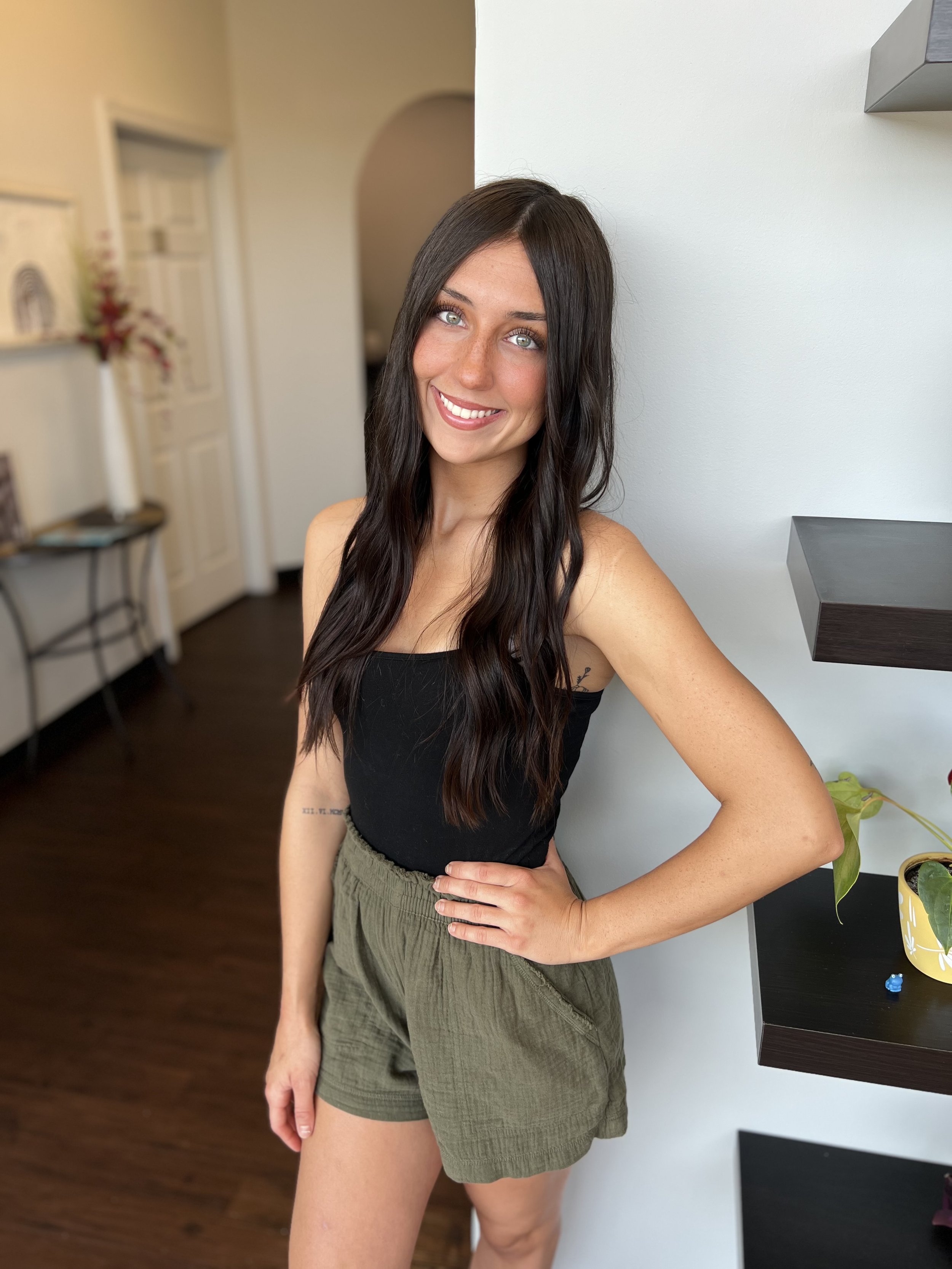Meet Delaney! Stylist at the Hair Artistry Collective specializing in blonding, highlights, and lived-in color.