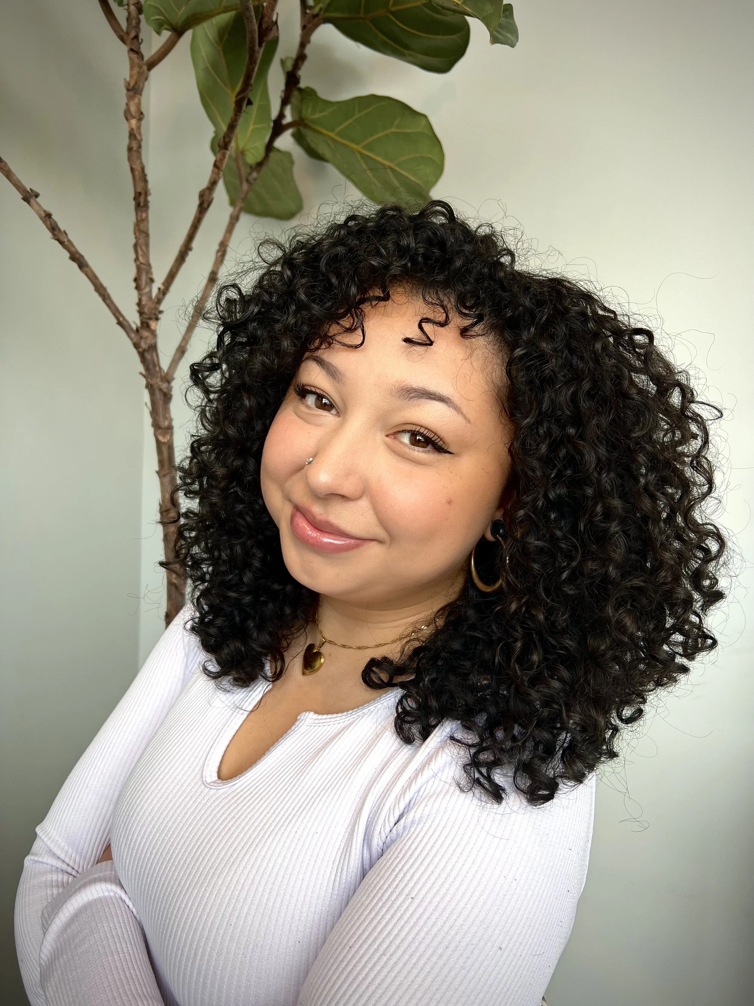 Meet Lily! A stylist at the Hair Artistry Collective in Morgantown, WV specializing in curly haircuts.