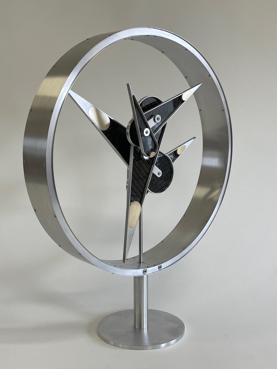 FLEDGELING - 2022
Brushed aluminum, brass, carbon fiber laminate, stainless steel