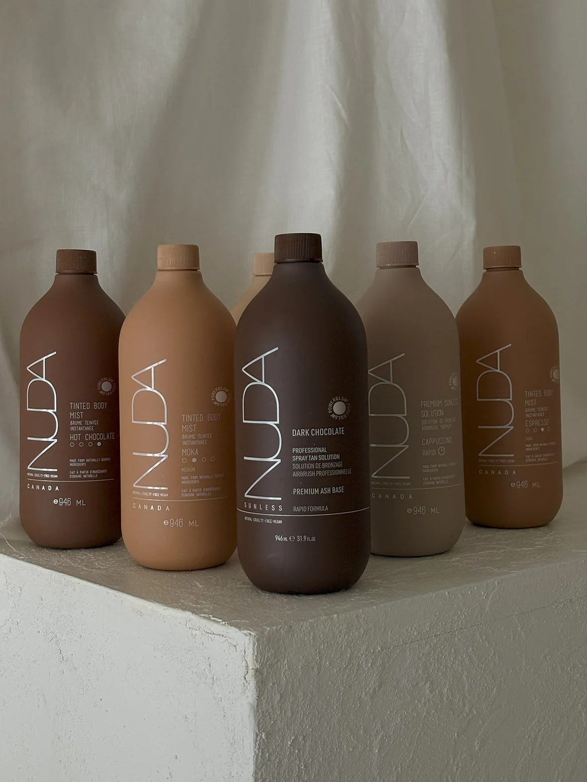 Nuda Spray Tan Products Used by All That Beauty Bar